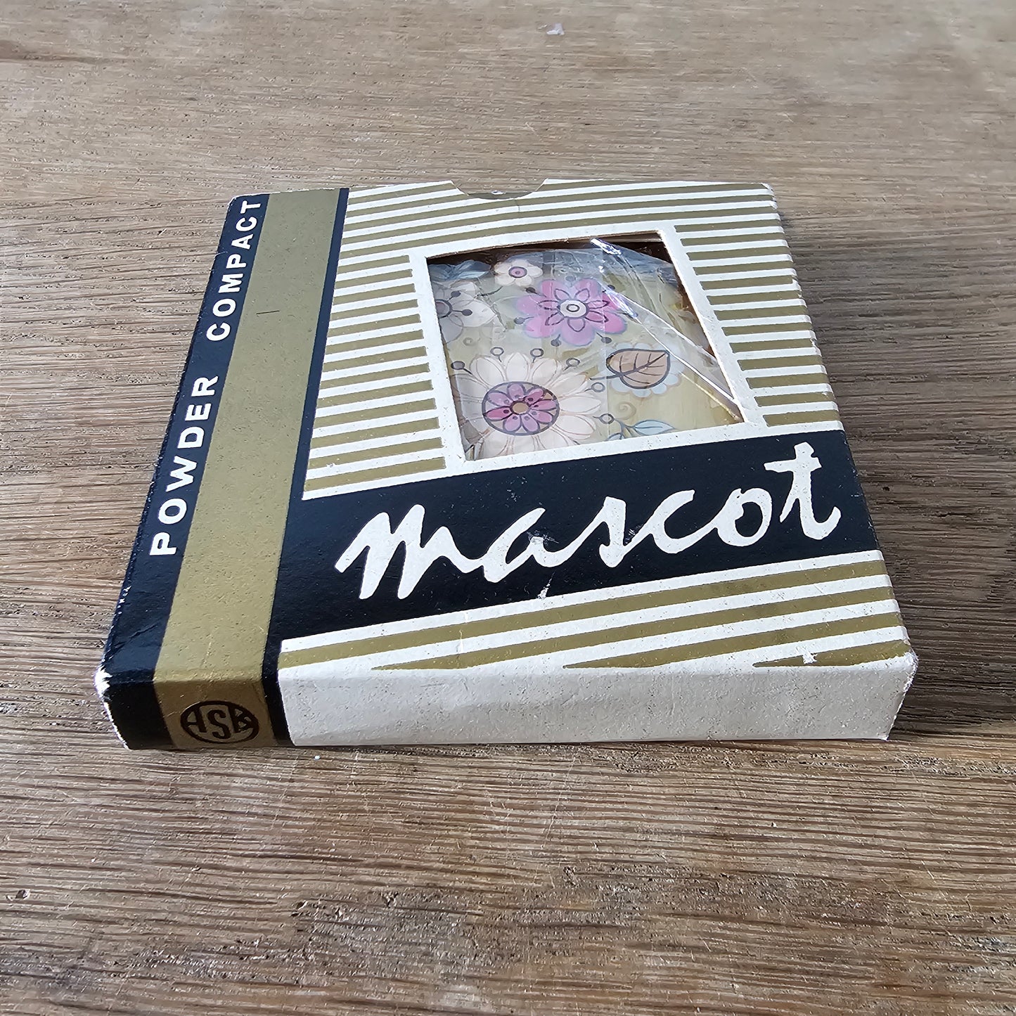1960s unused Mascot gold-tone floral powder compact