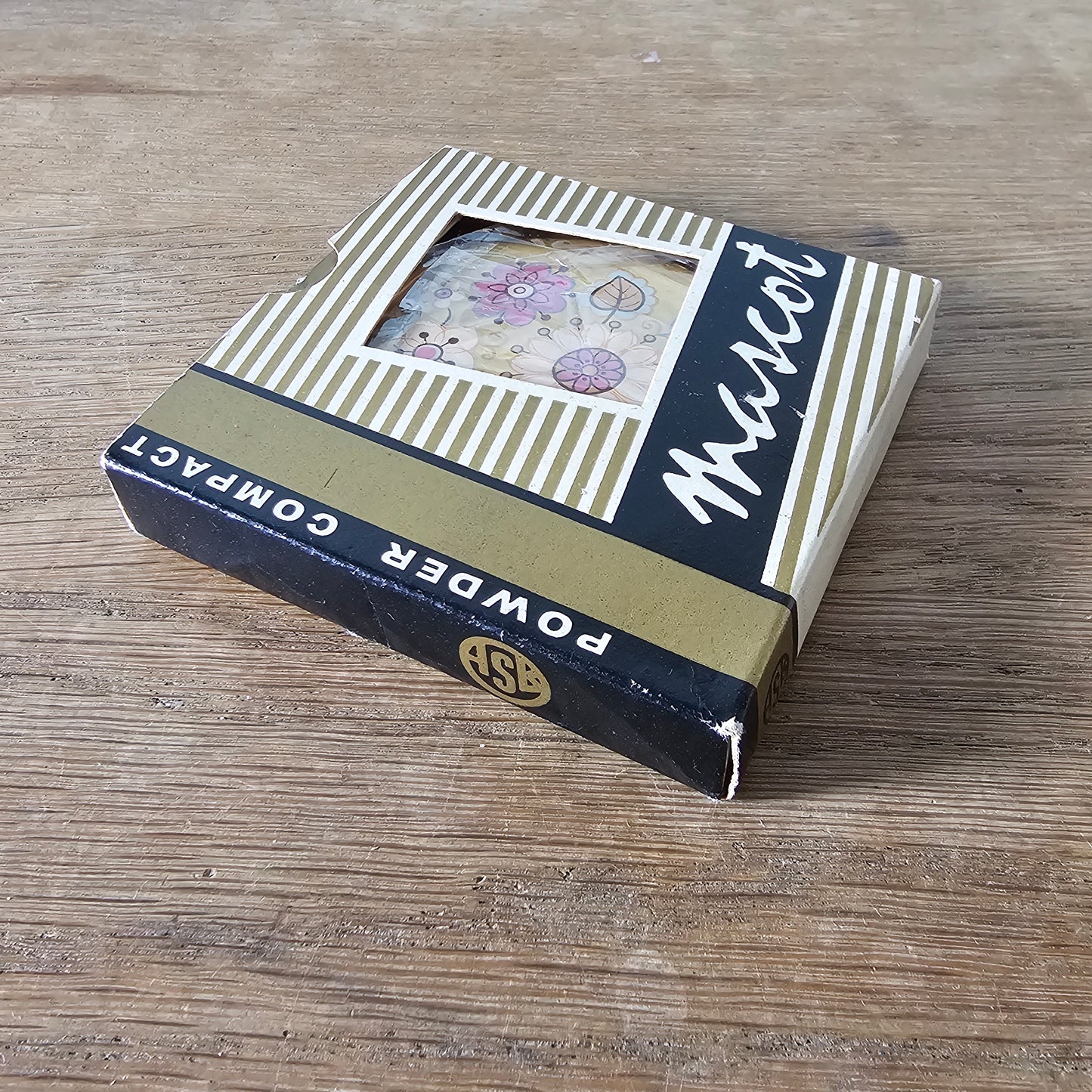 1960s unused Mascot gold-tone floral powder compact