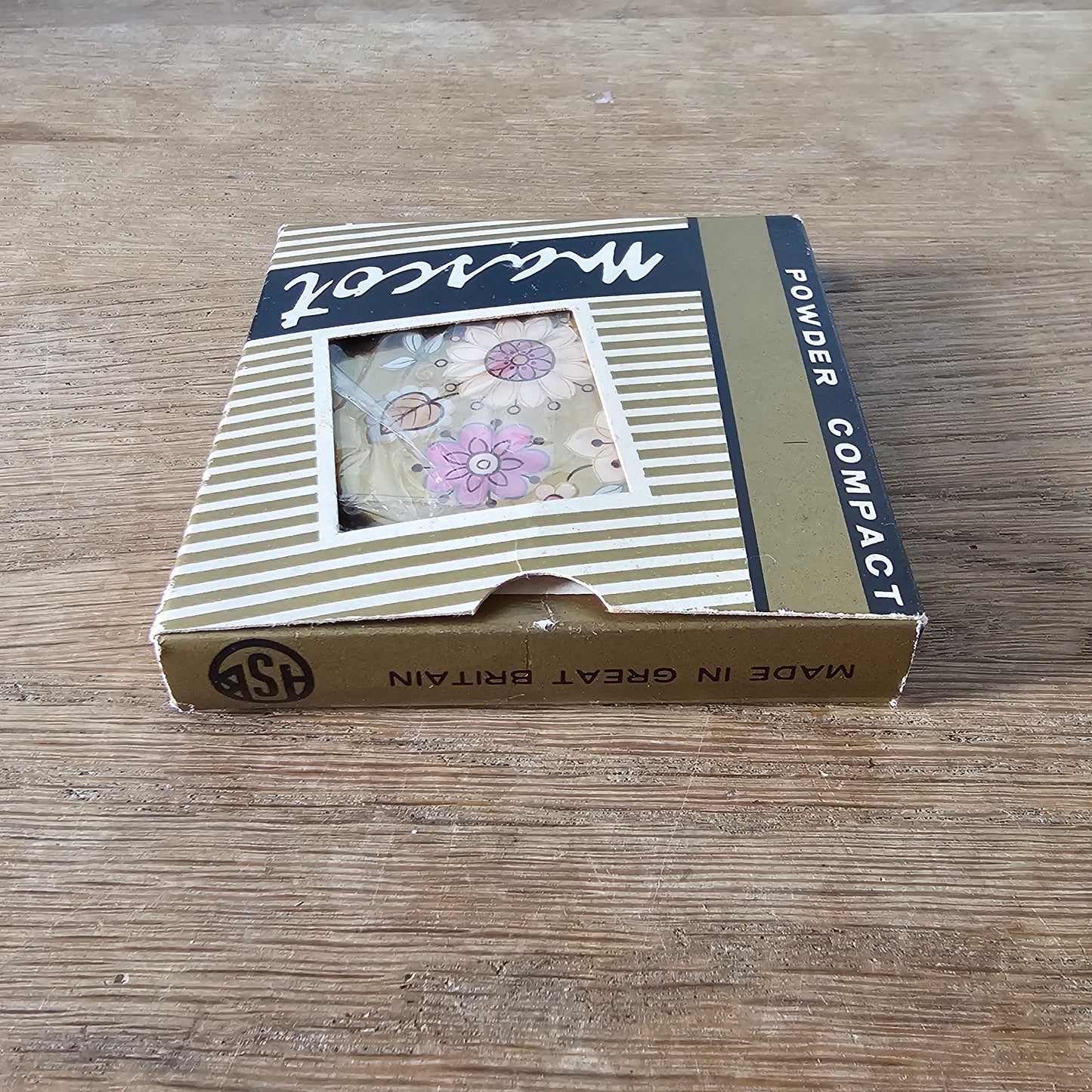 1960s unused Mascot gold-tone floral powder compact