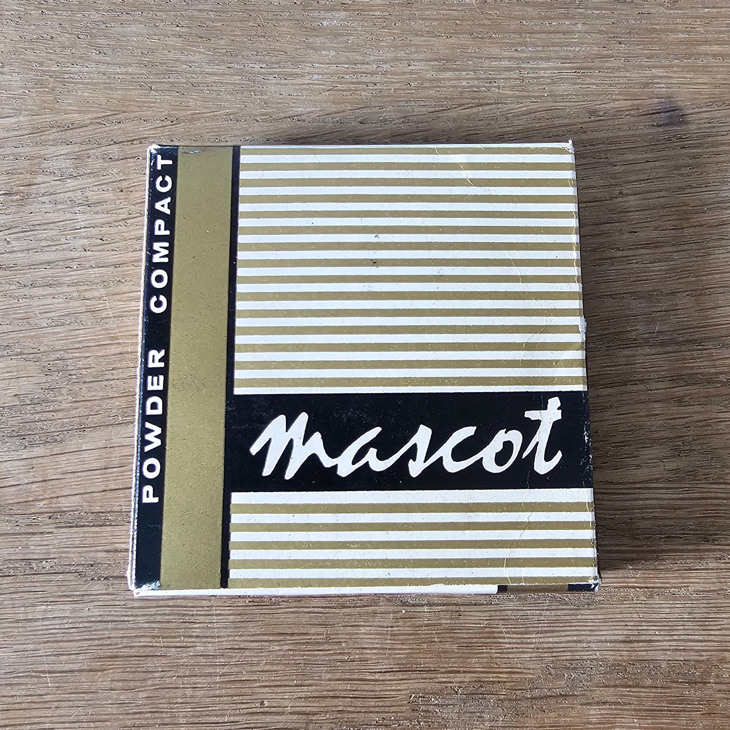 1960s unused Mascot gold-tone floral powder compact