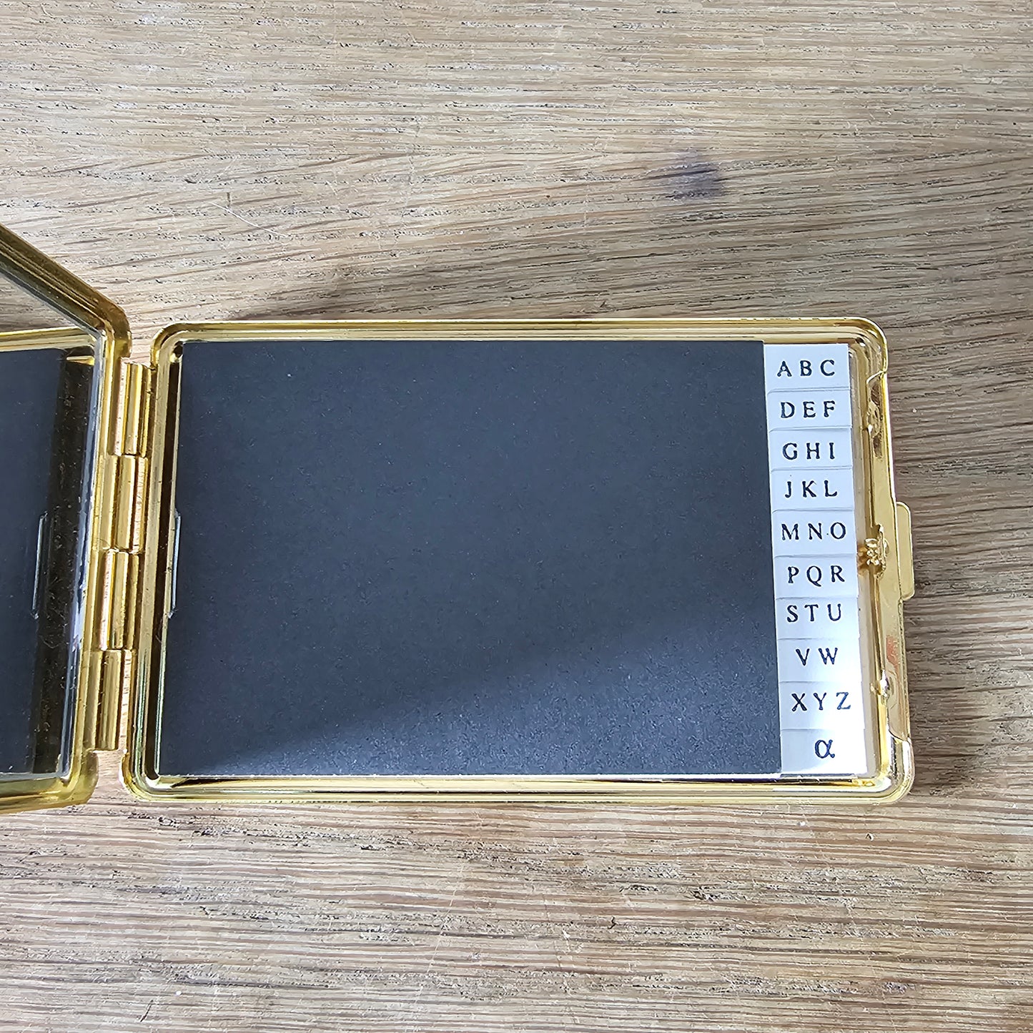 1960/70s gold-tone mirrored address book compact