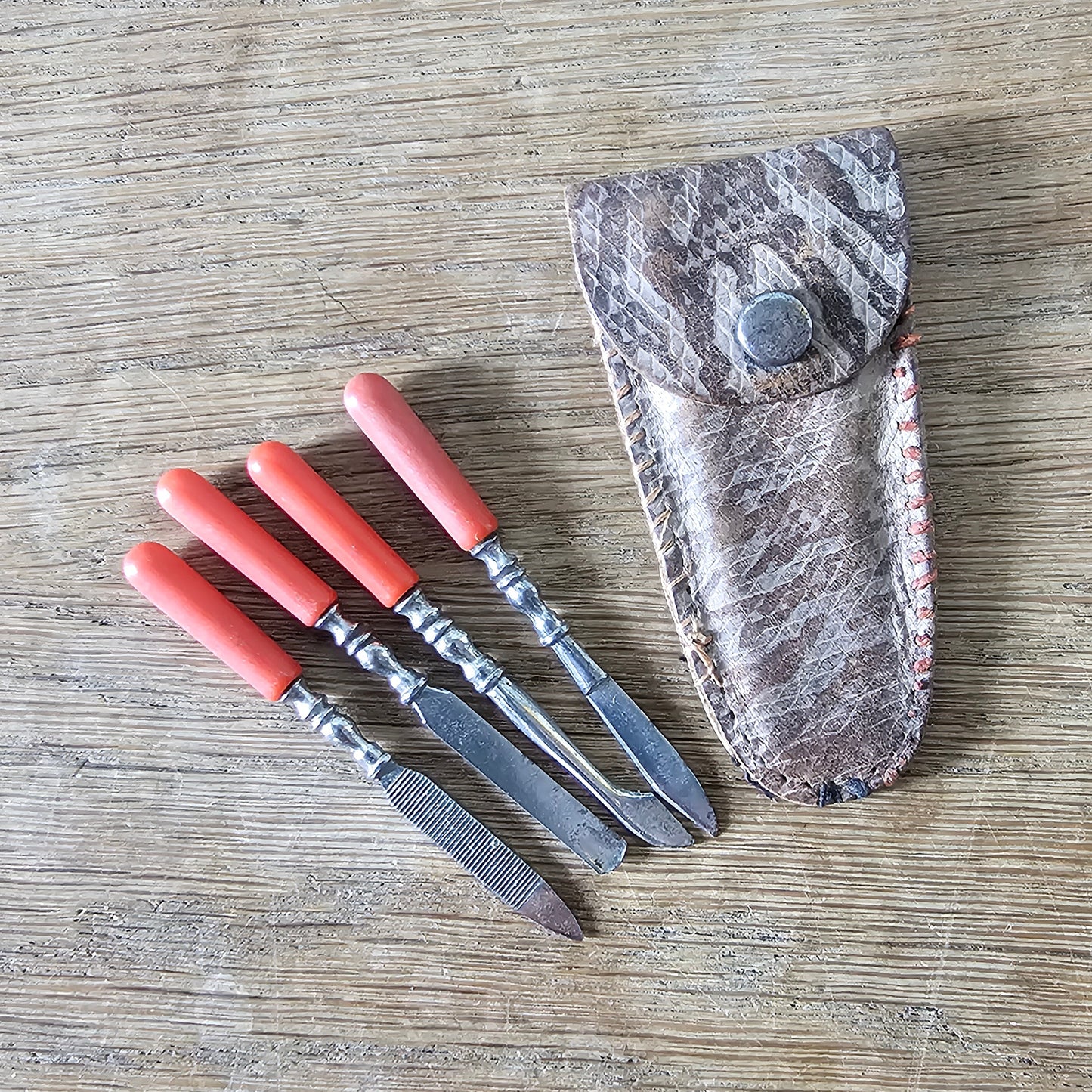 circa. 1940s miniature Bakelite manicure set with faux snakeskin leather pouch