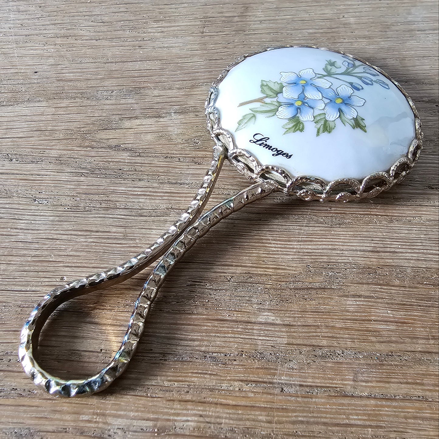 1960s Limoges gold-tone floral porcelain hand mirror