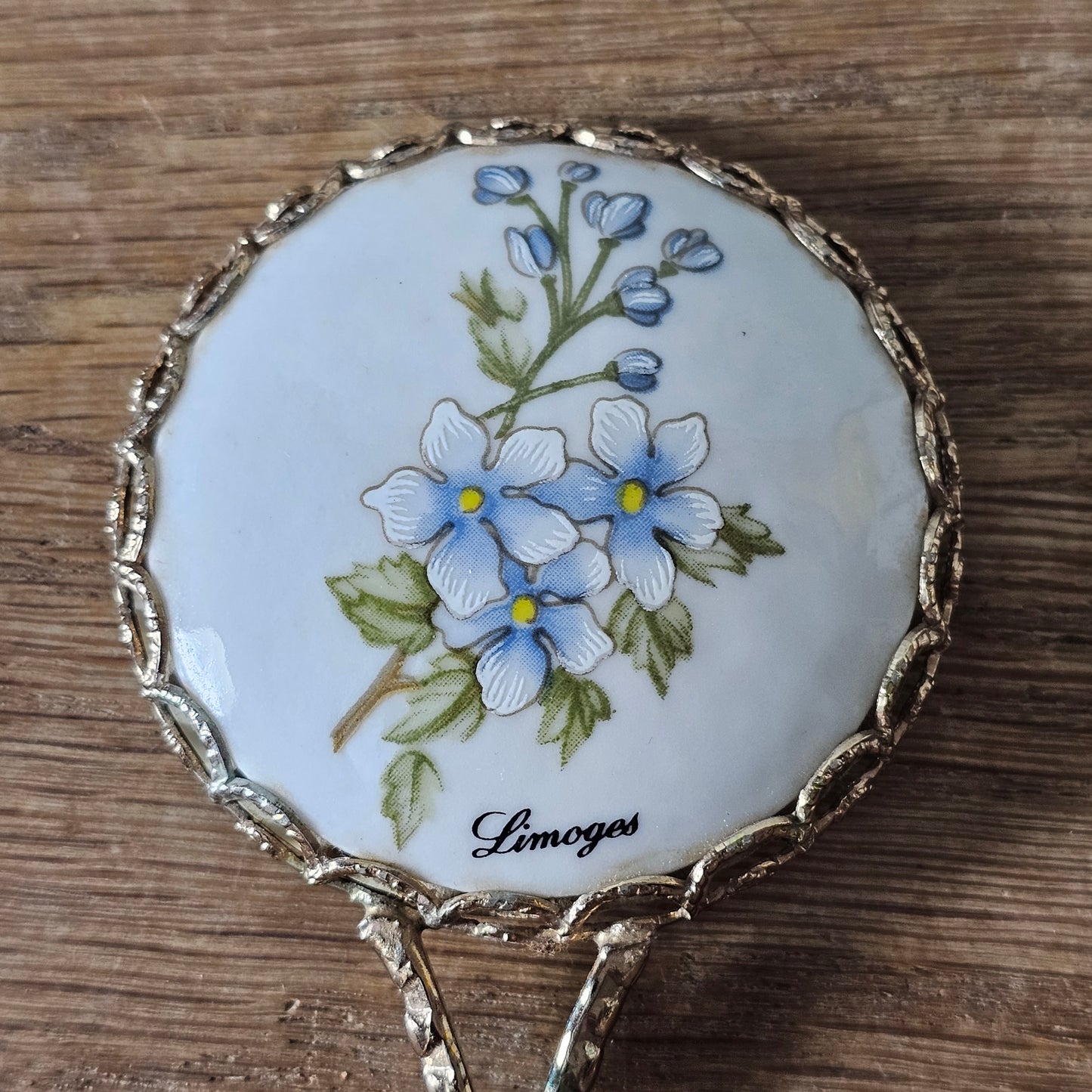 1960s Limoges gold-tone floral porcelain hand mirror