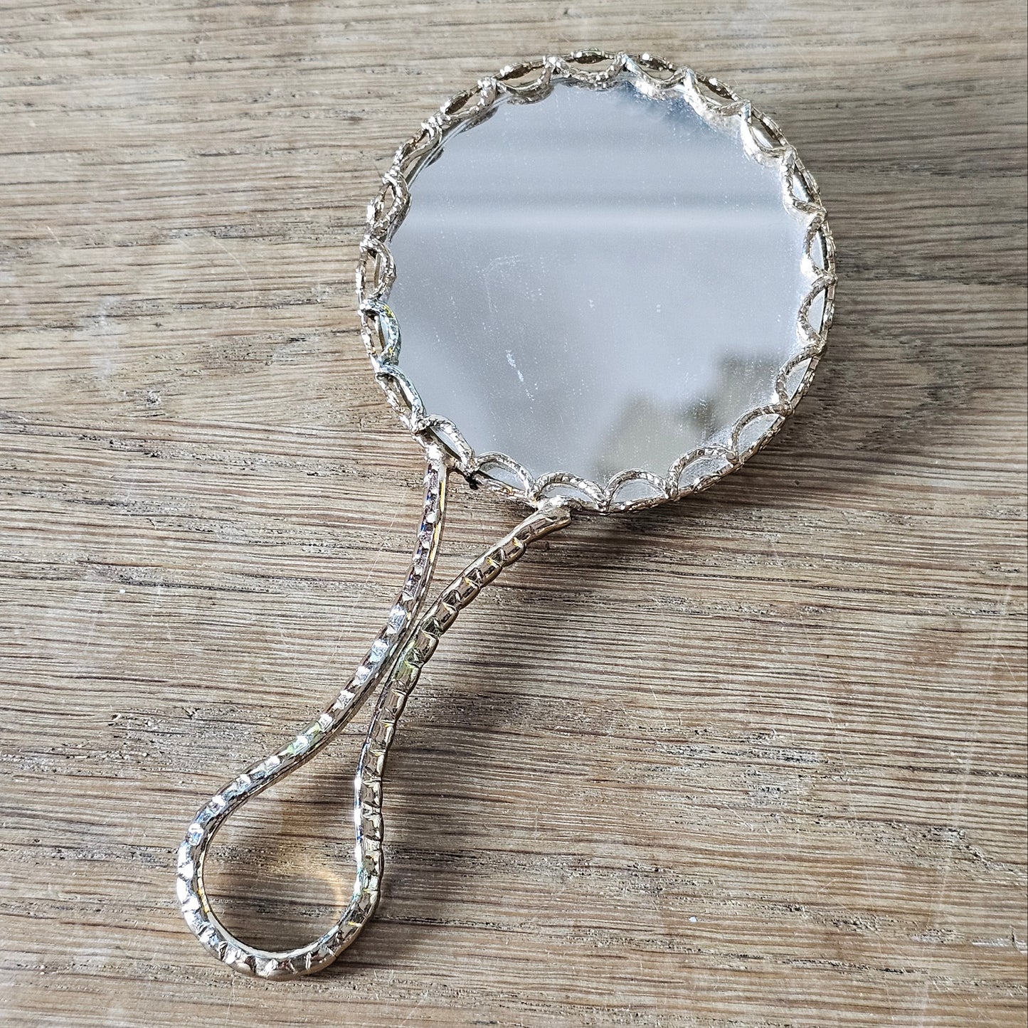 1960s Limoges gold-tone floral porcelain hand mirror