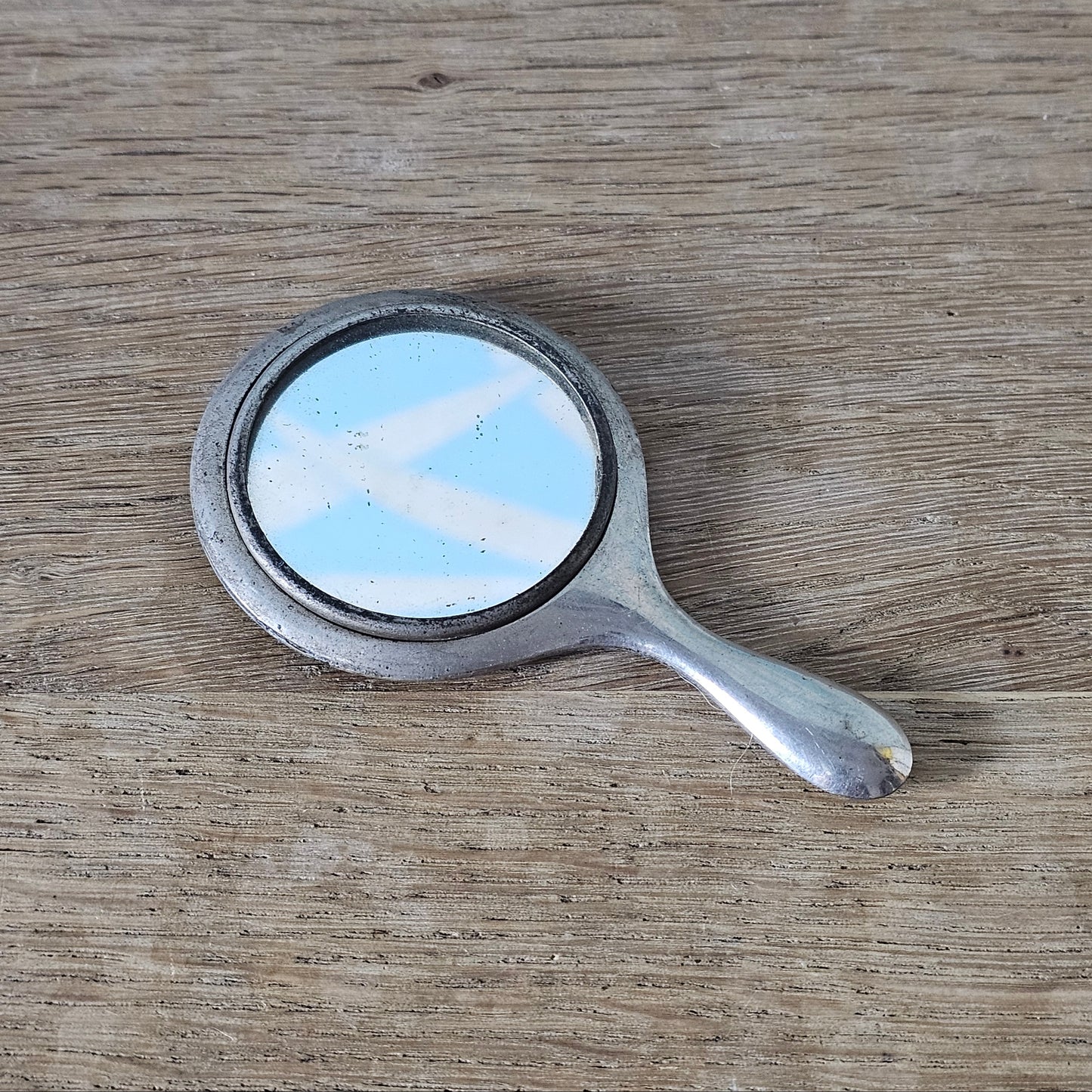 circa. 1940s silver-tone handbag mirror with original leather pouch