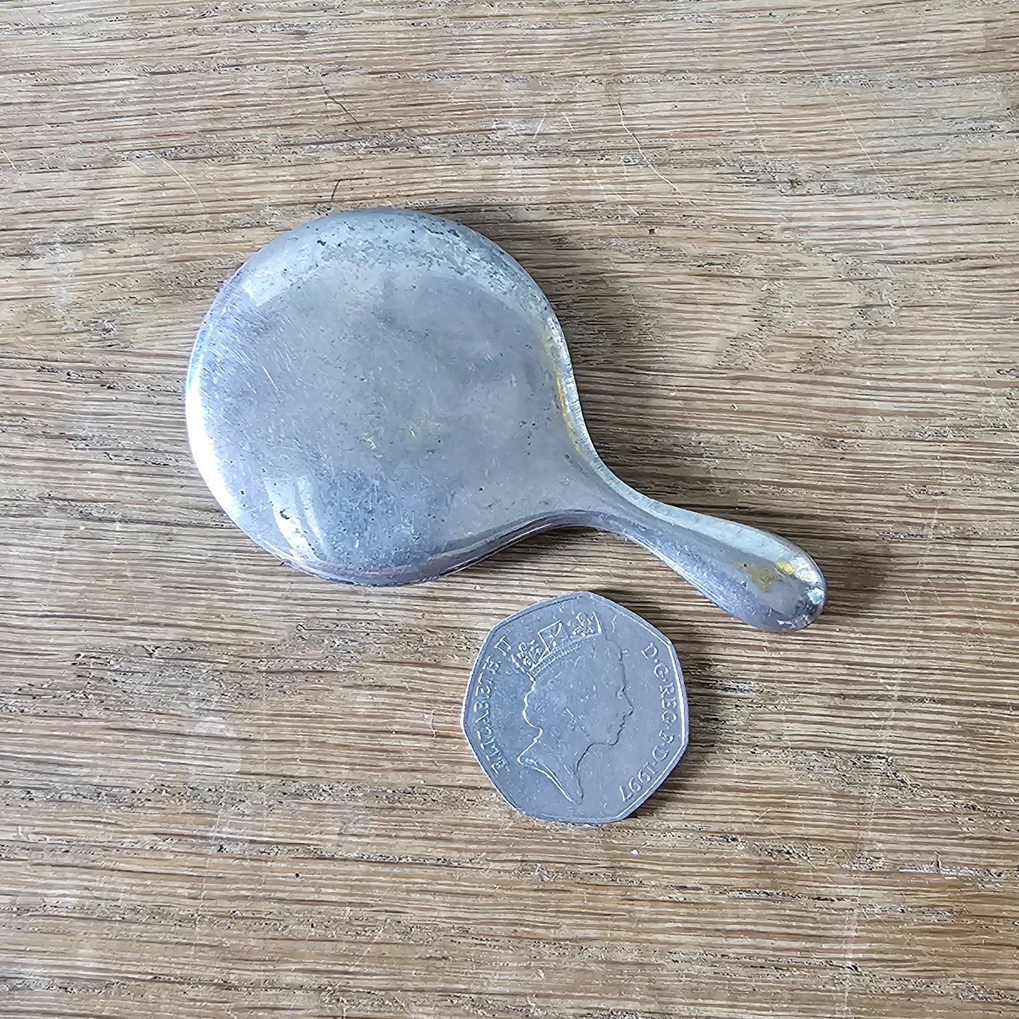 circa. 1940s silver-tone handbag mirror with original leather pouch