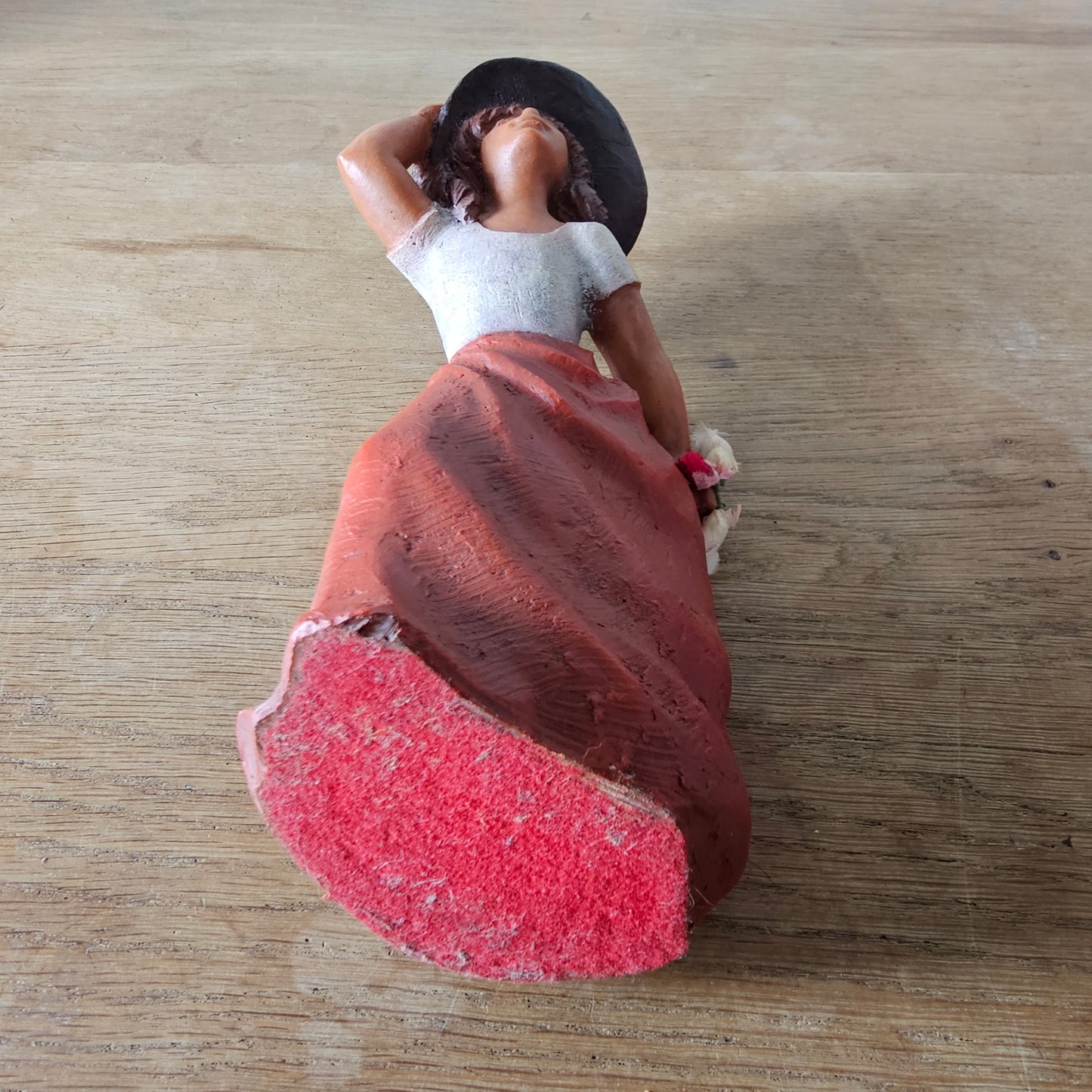 1990s signed sculpted resin country girl figurine leaning into the wind