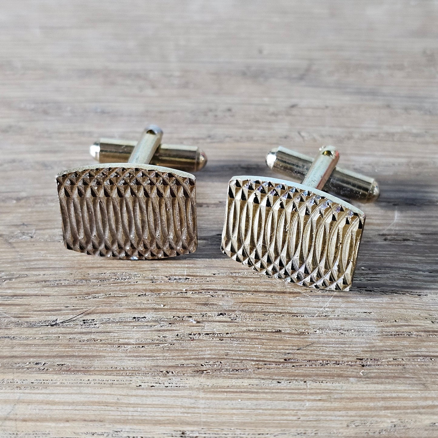1960s gold-tone engraved curved rectangular cufflinks