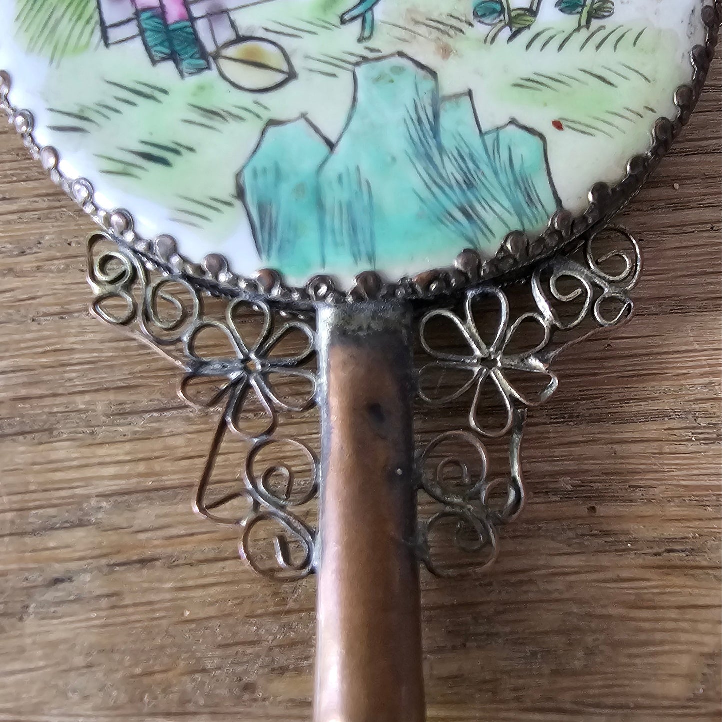 Art Deco hand-painted porcelain vanity mirror with serpentine handle