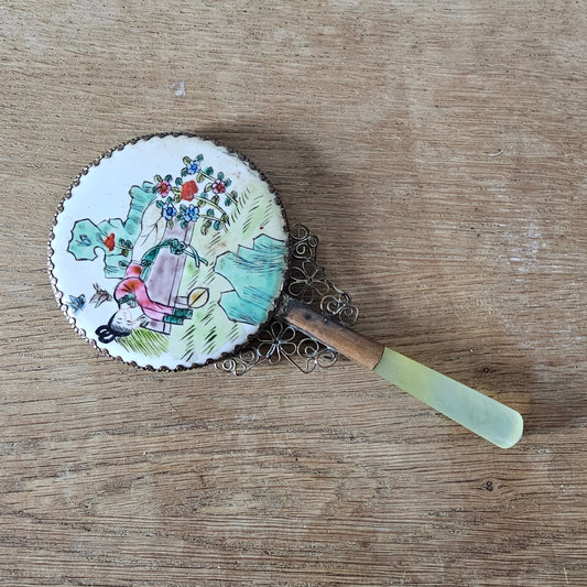Art Deco hand-painted porcelain vanity mirror with serpentine handle
