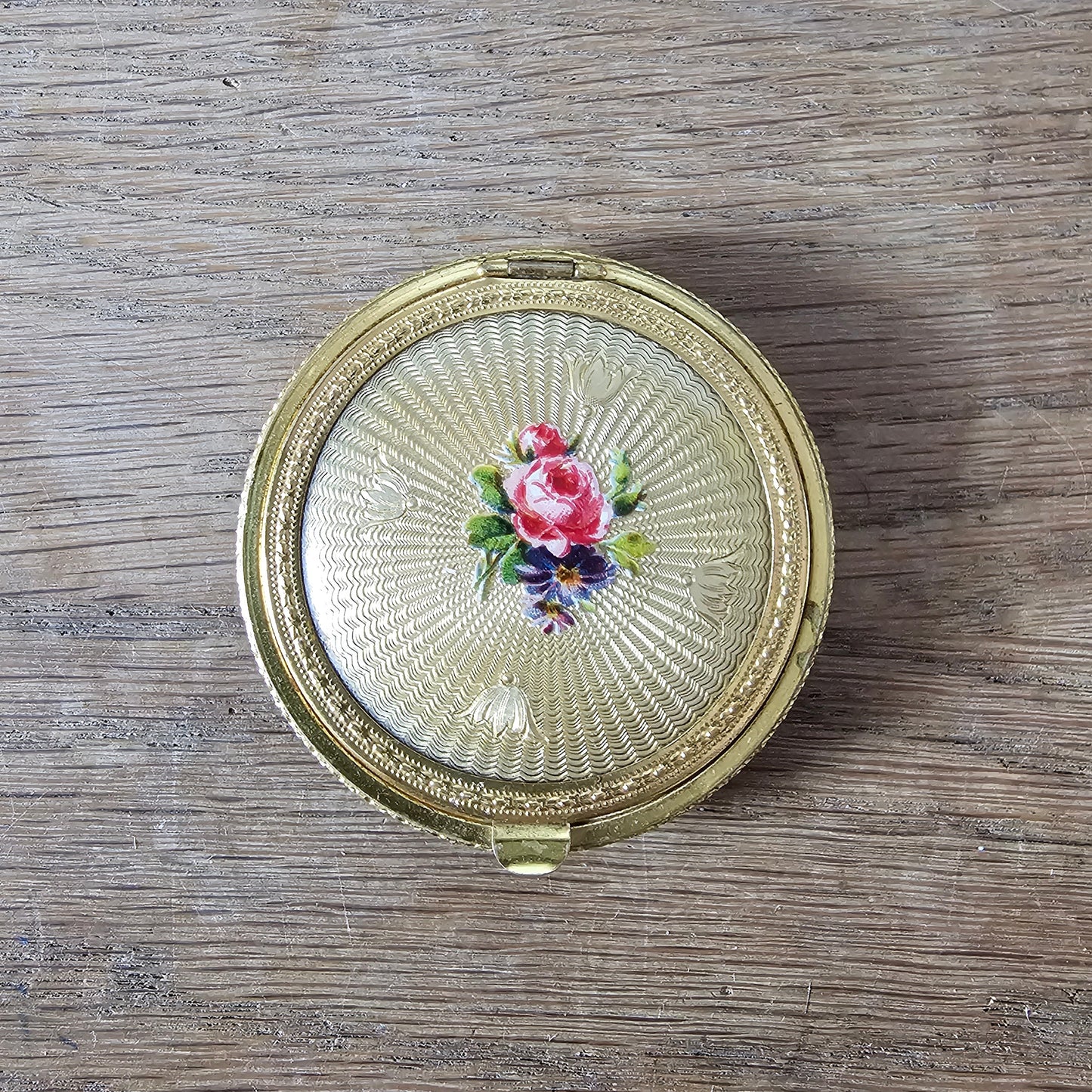 1950s/60s gold-tone mini powder compact with rose transfer design