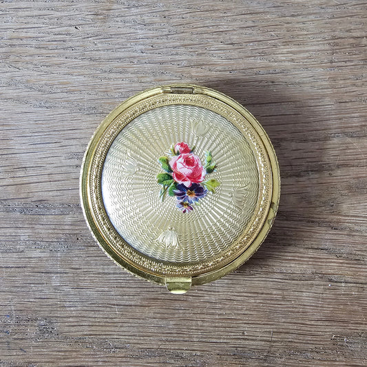 1950s/60s gold-tone mini powder compact with rose transfer design