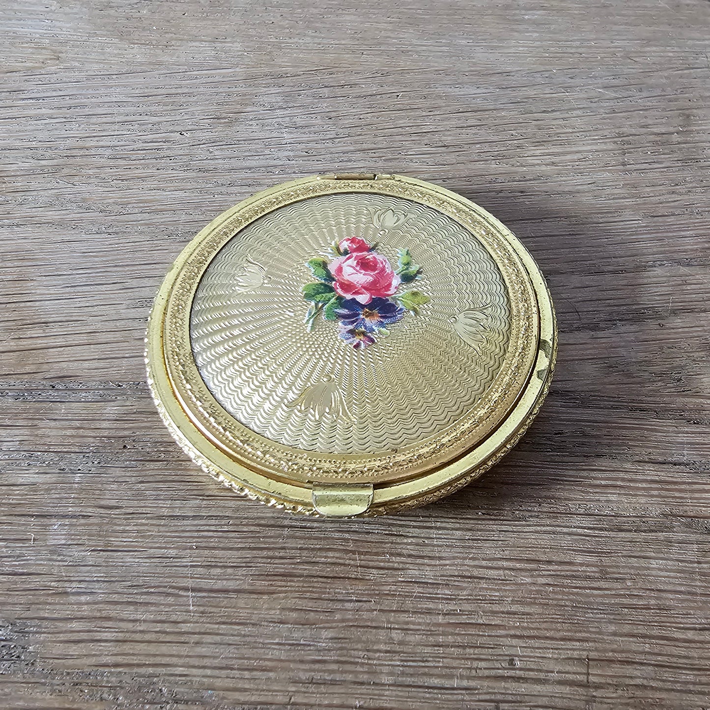 1950s/60s gold-tone mini powder compact with rose transfer design