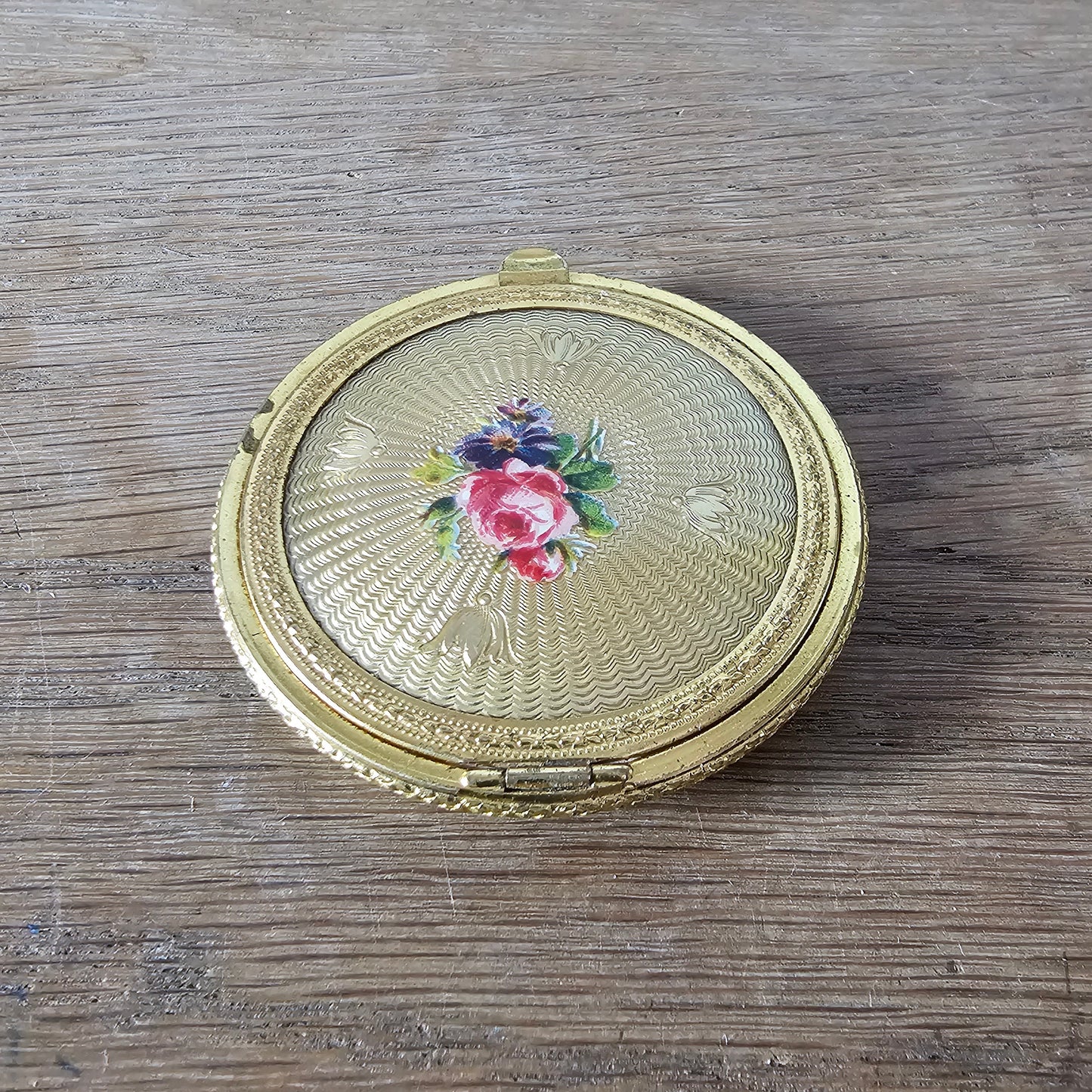 1950s/60s gold-tone mini powder compact with rose transfer design