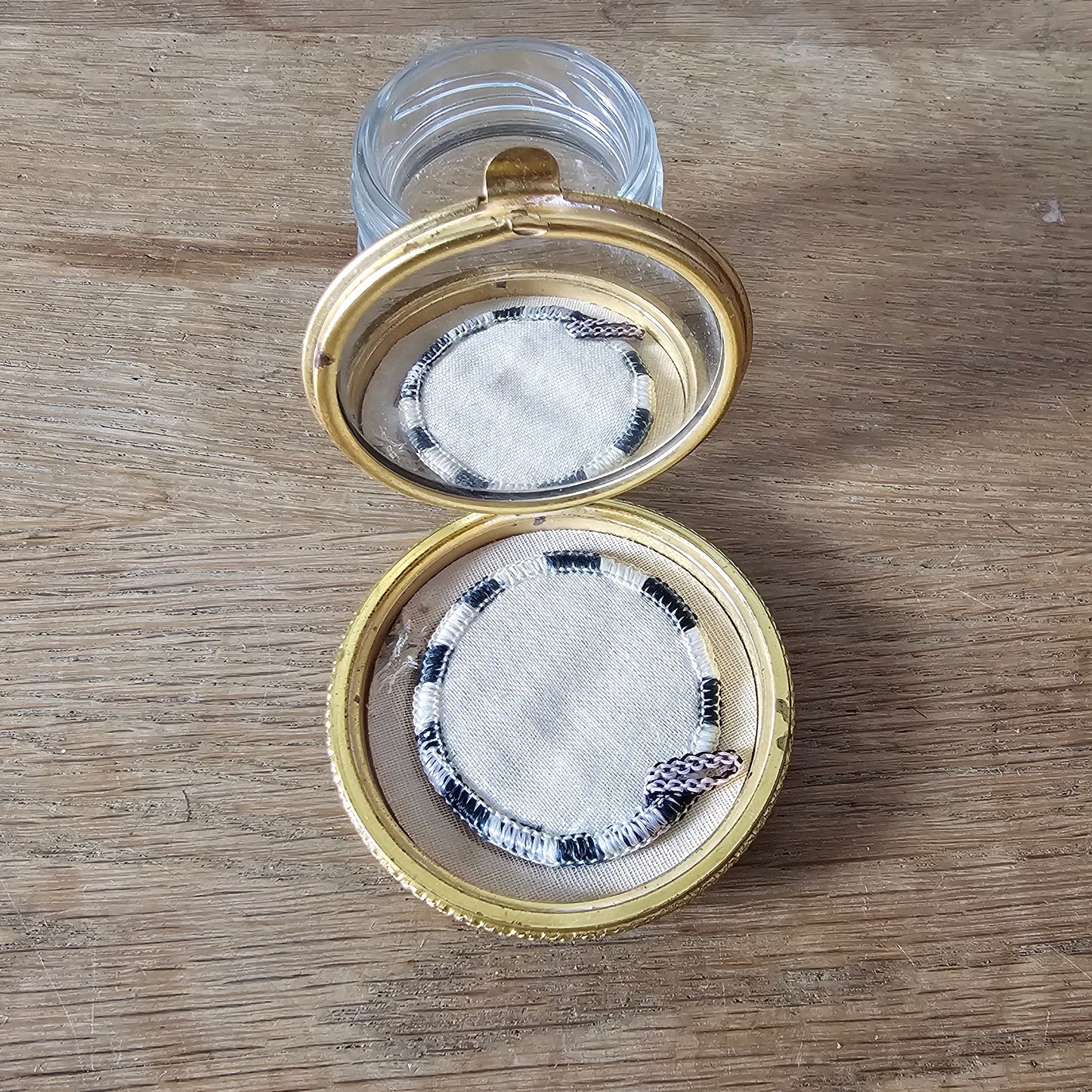 1950s/60s gold-tone mini powder compact with rose transfer design