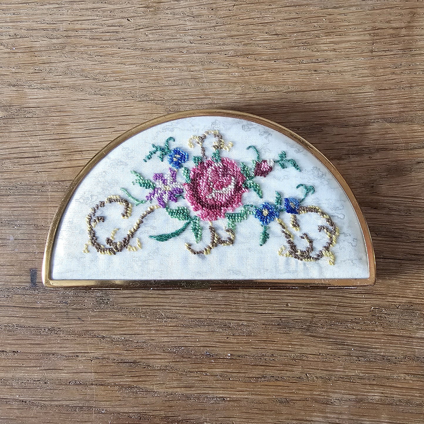 1950s needlepoint floral panel & gold-tone half moon powder compact (empty)