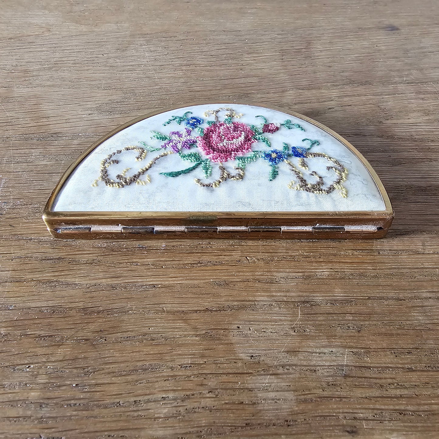 1950s needlepoint floral panel & gold-tone half moon powder compact (empty)