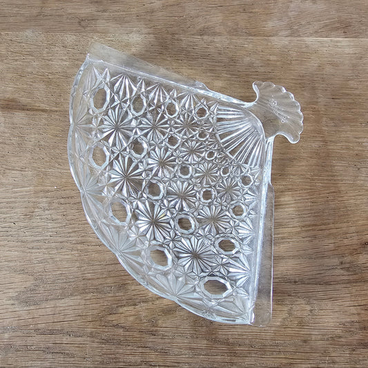 1970s Avon pressed glass fan-shaped trinket dish with starburst pattern