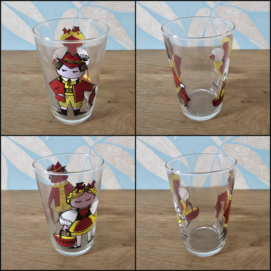Set of four 1960s Saint-Gobain “World Doll” character tumblers with original box