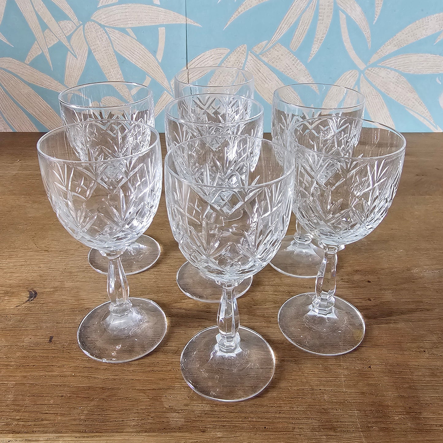 Set of seven 1990s cut crystal wine glasses