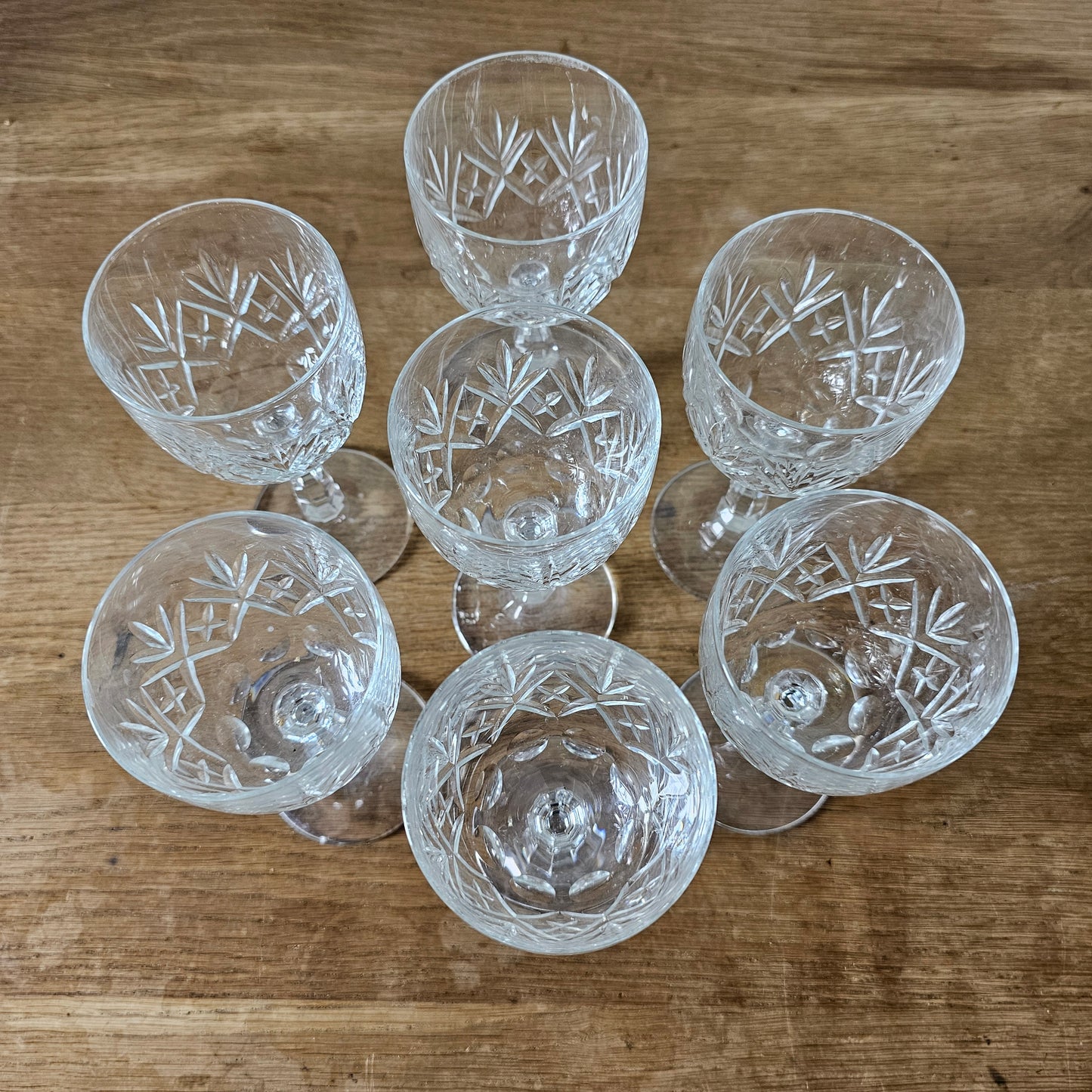 Set of seven 1990s cut crystal wine glasses