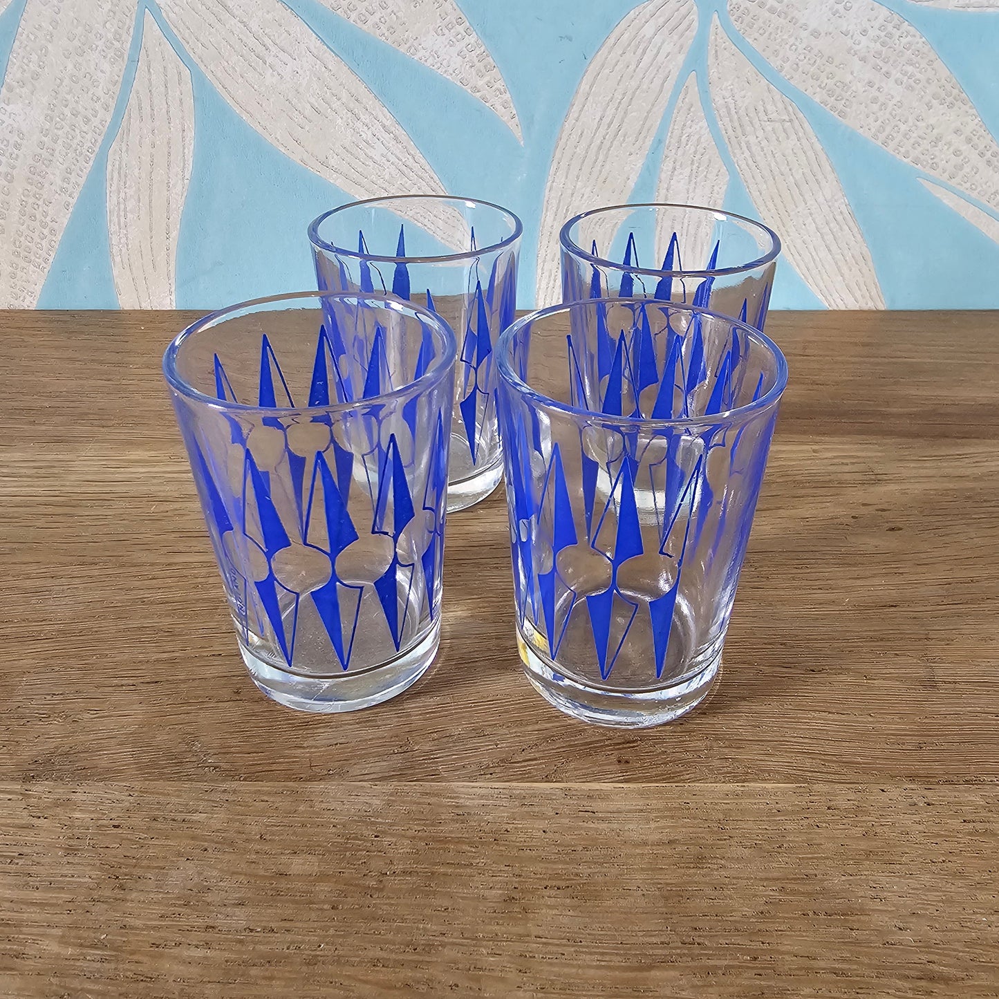 Set of four 1960s blue "Zulu" tot glasses by Hardie Williamson for Ravenhead Glass