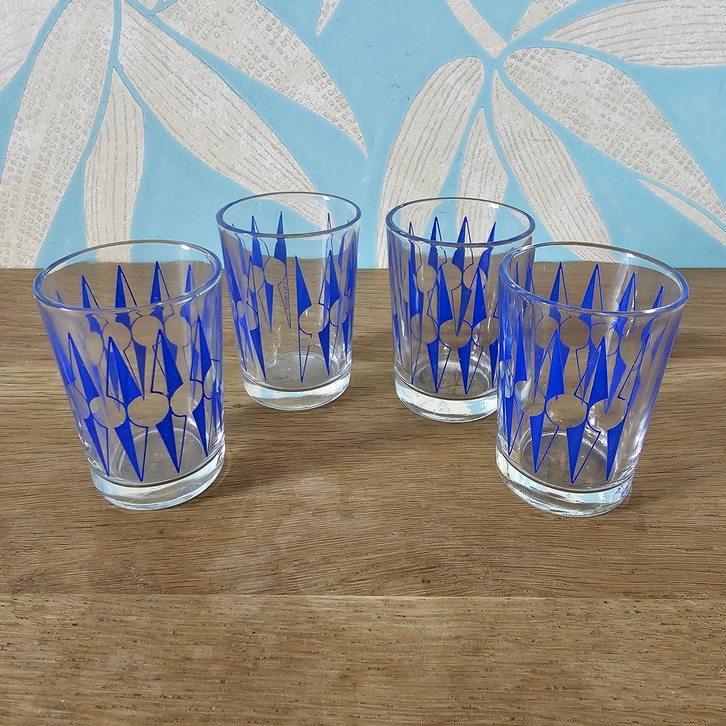Set of four 1960s blue "Zulu" tot glasses by Hardie Williamson for Ravenhead Glass