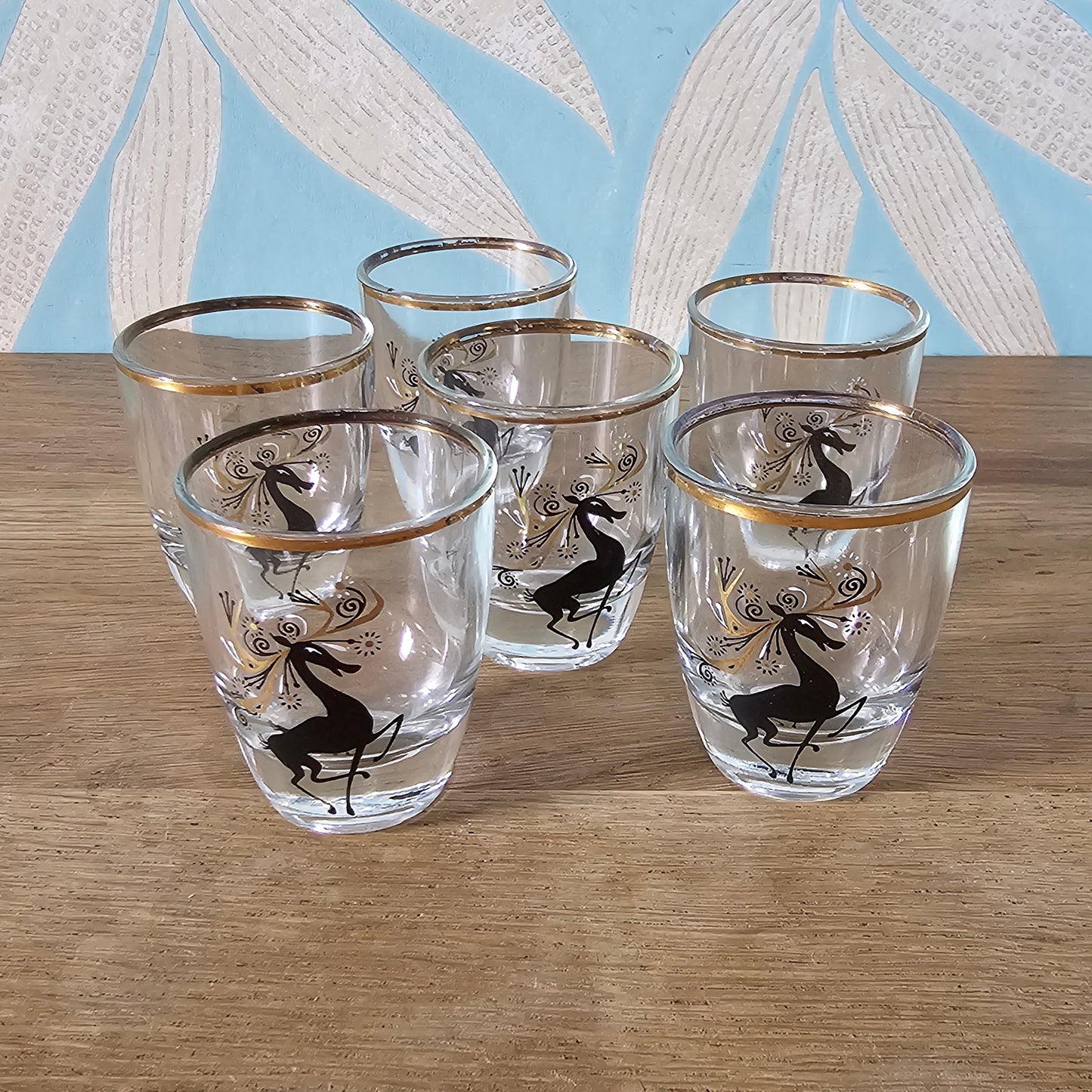 Set of 6 mid-century black & gilt reindeer shot glasses
