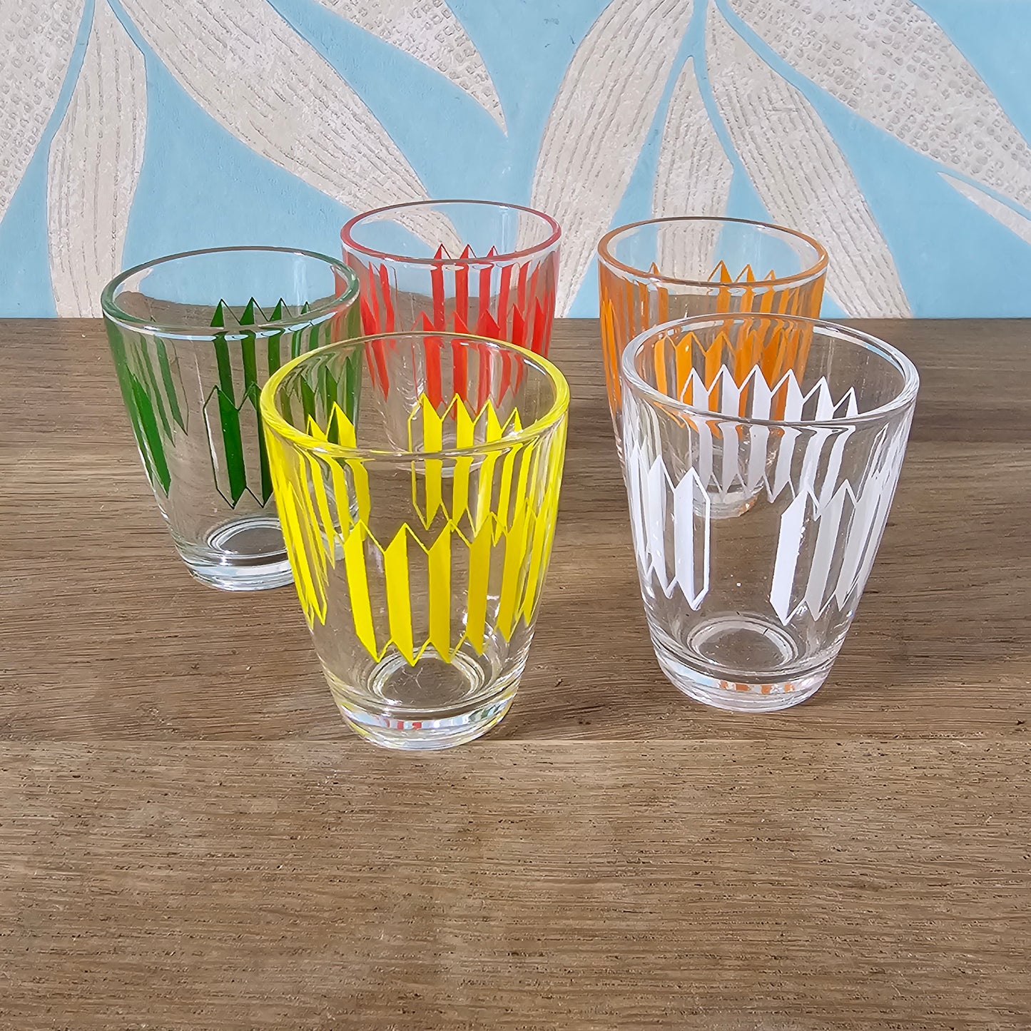 Set of five 1960s multicoloured geometric pattern shot glasses