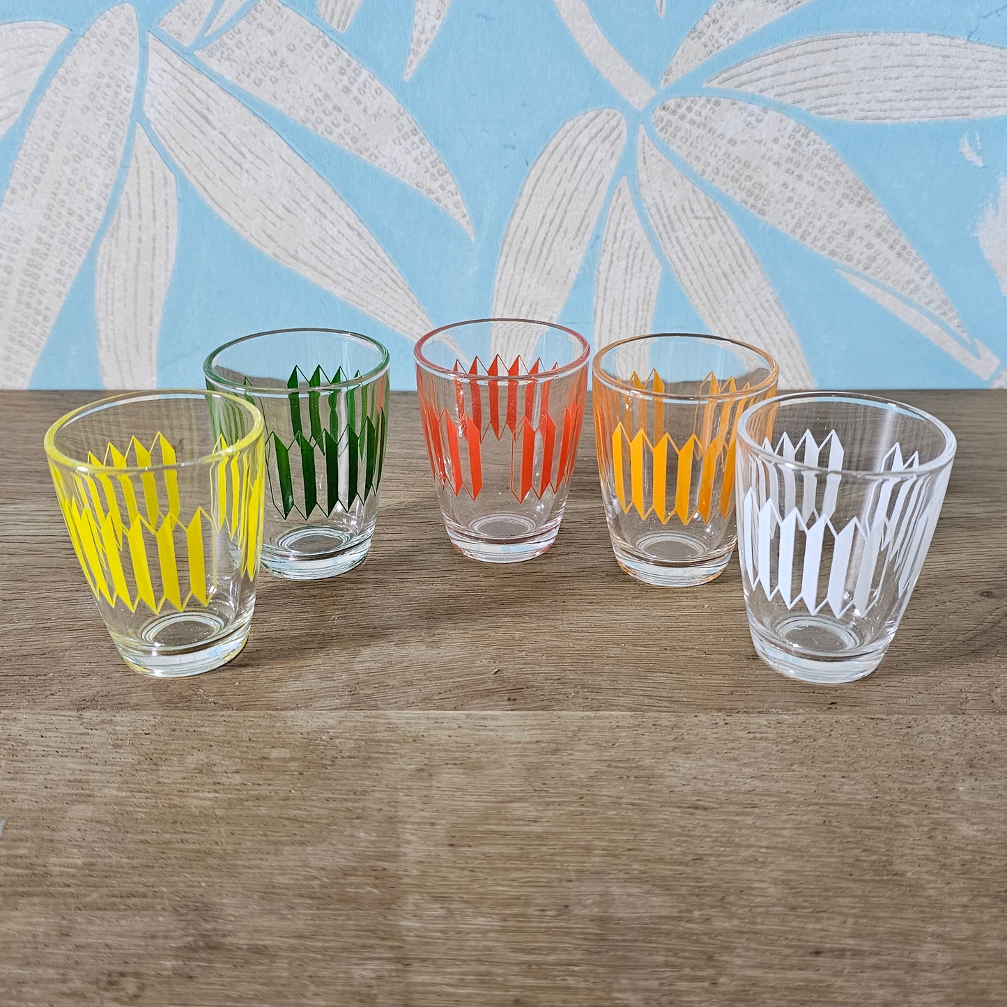 Set of five 1960s multicoloured geometric pattern shot glasses