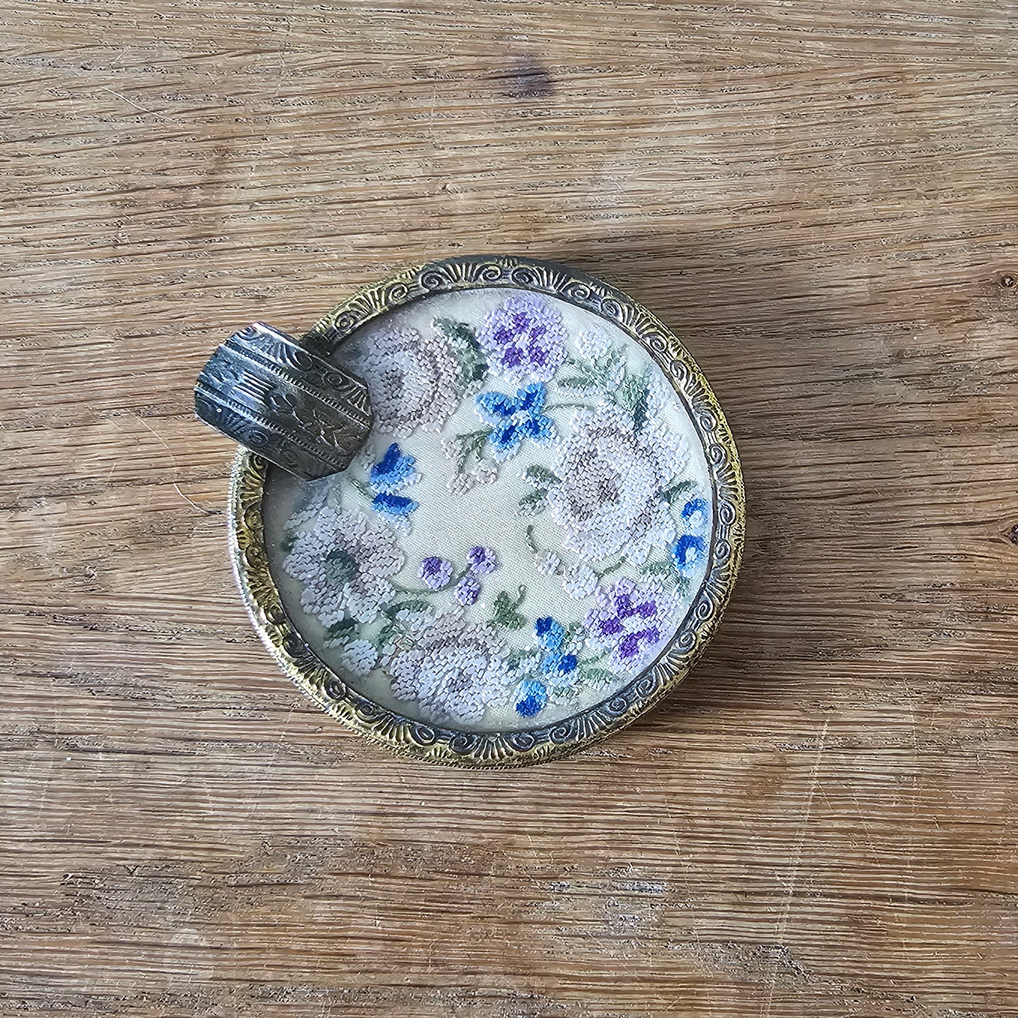 Vintage gilt metal and glass ladies’ ashtray with petit point floral embroidery