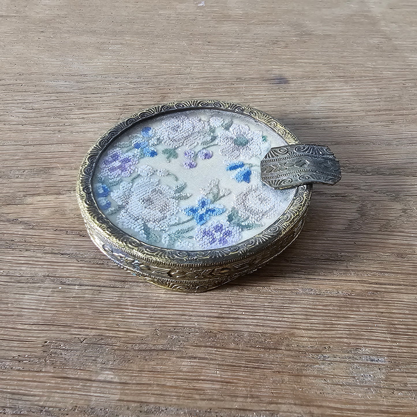 Vintage gilt metal and glass ladies’ ashtray with petit point floral embroidery
