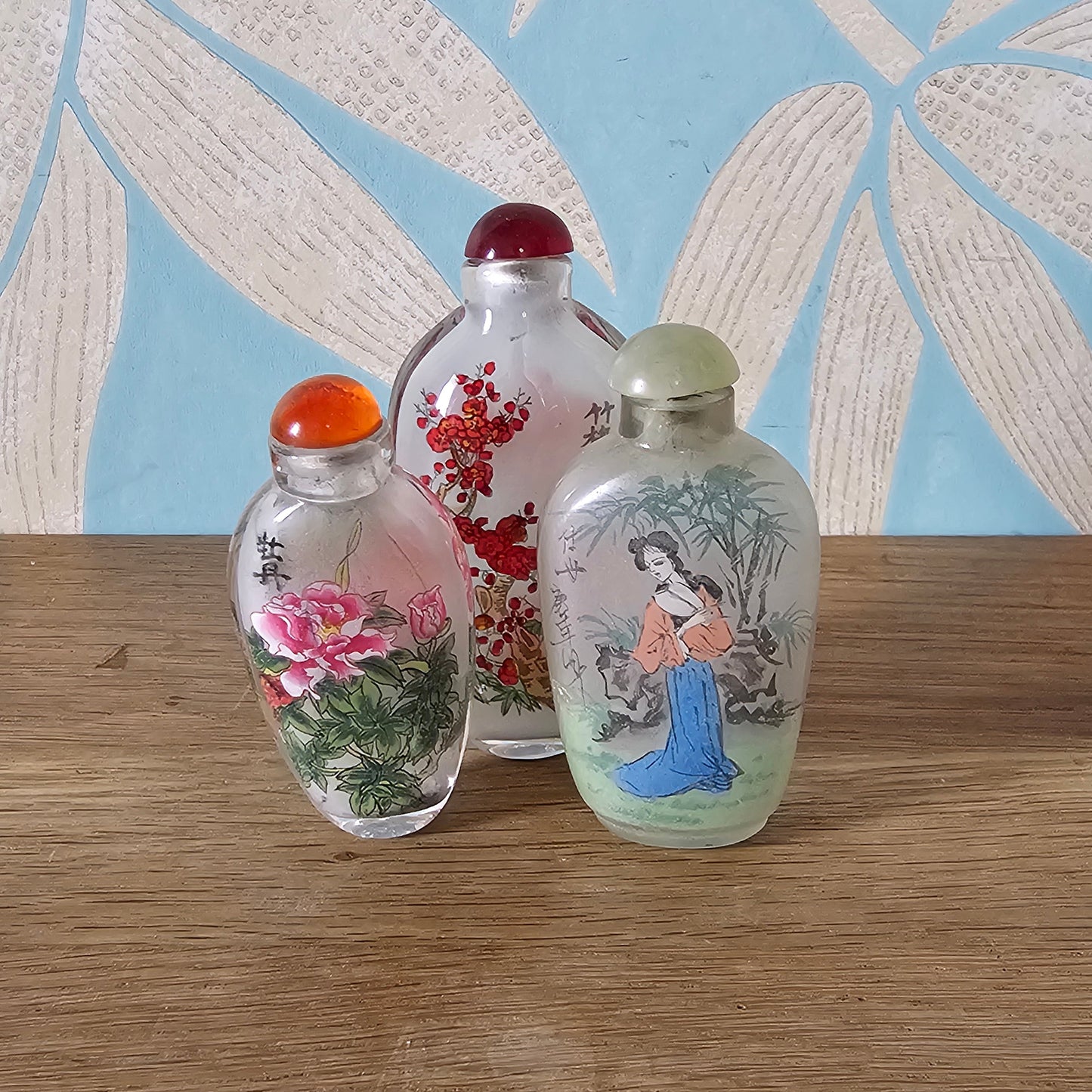 Vintage Chinese reverse painted Bamboo & Plum glass snuff bottle with red glass stopper