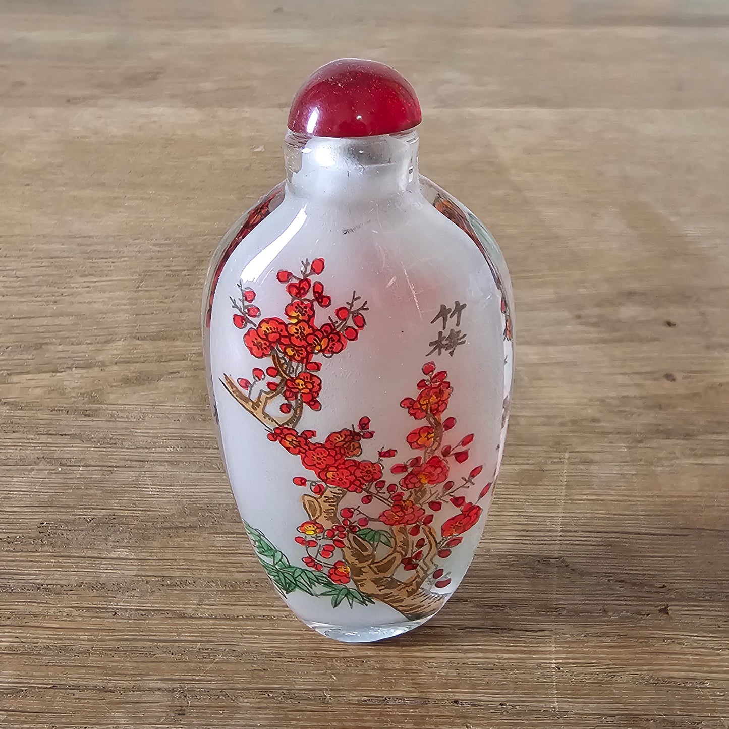 Vintage Chinese reverse painted Bamboo & Plum glass snuff bottle with red glass stopper