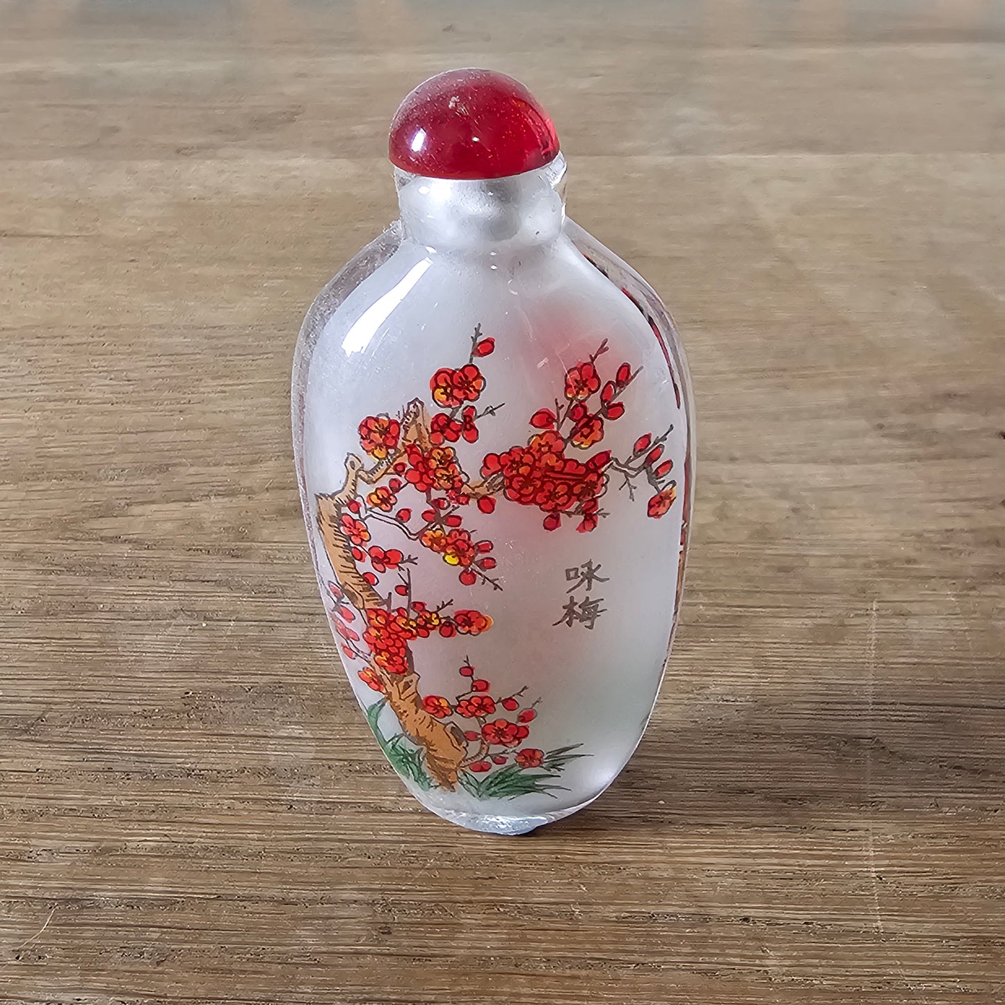 Vintage Chinese reverse painted Bamboo & Plum glass snuff bottle with red glass stopper