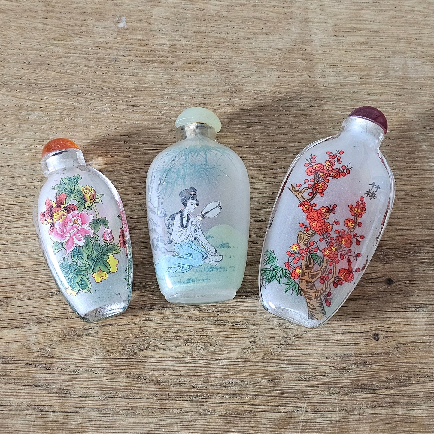 Vintage Chinese reverse painted Bamboo & Plum glass snuff bottle with red glass stopper