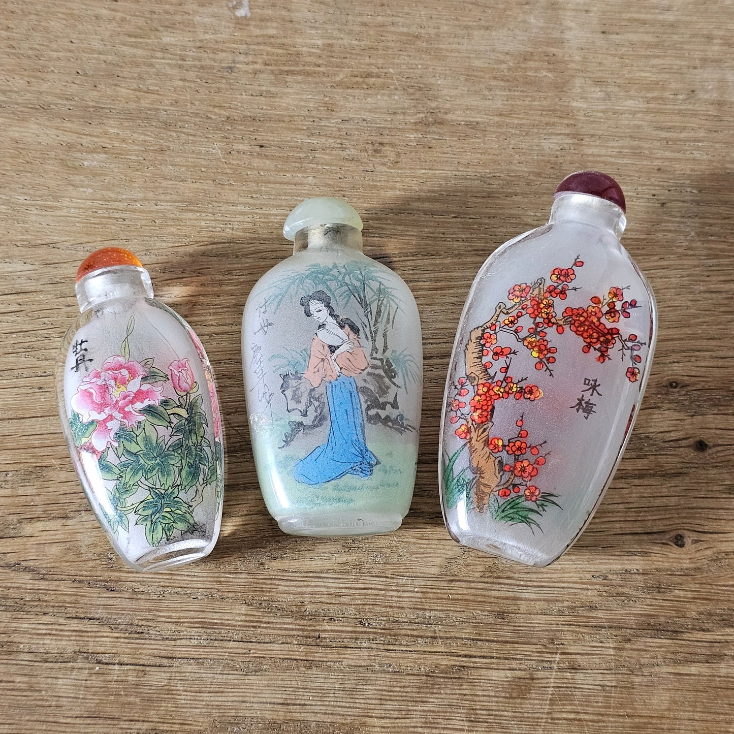 Vintage Chinese reverse painted Bamboo & Plum glass snuff bottle with red glass stopper