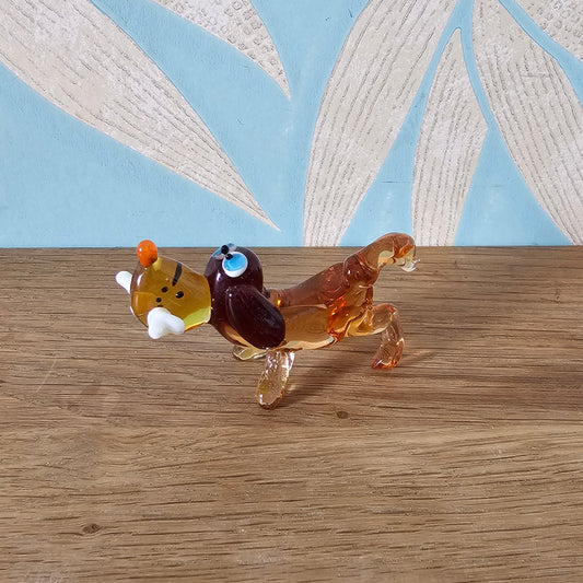 1970s Murano-style amber art glass daschund with bone figurine