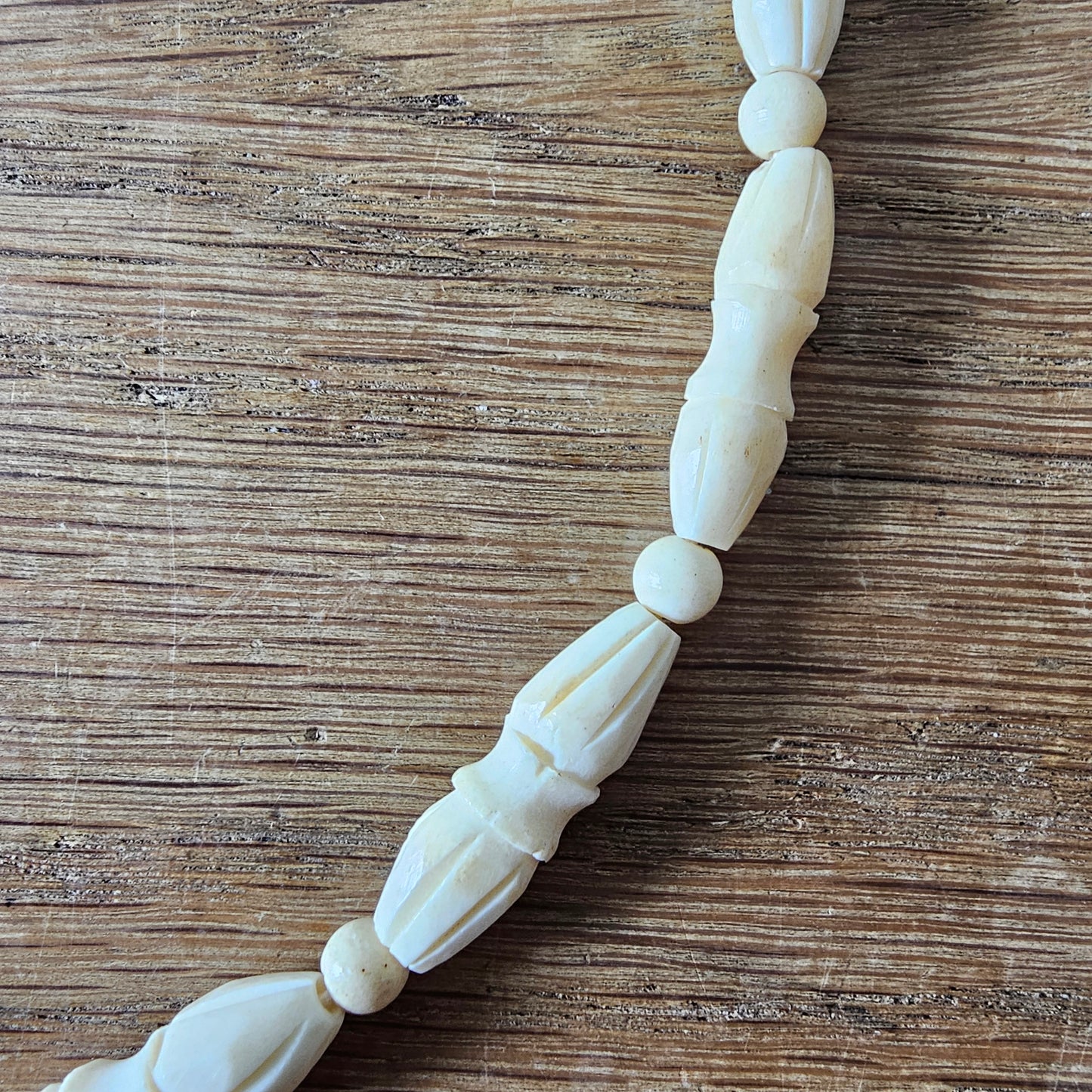 1940s carved bone butterfly & floral pendant bead necklace