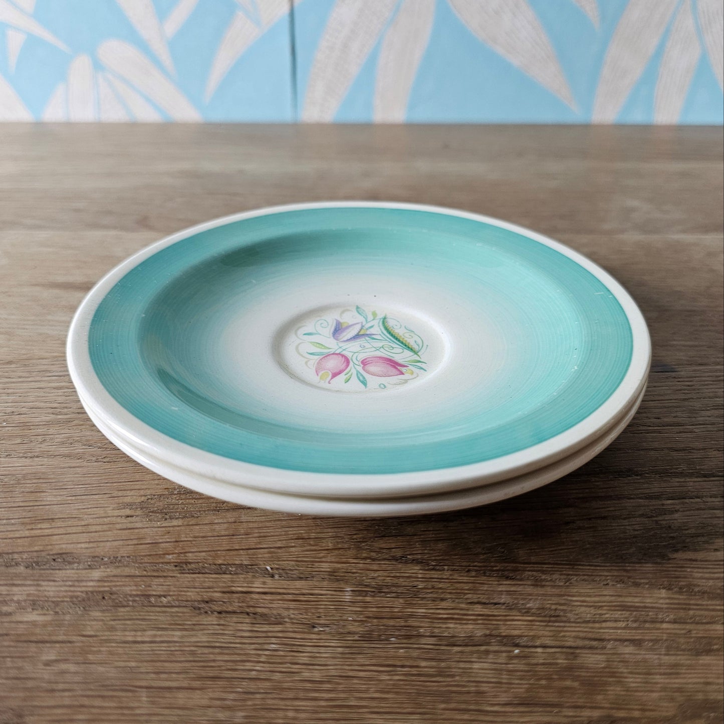 Pair of 1930s Susie Cooper "Dresden Spray" saucers