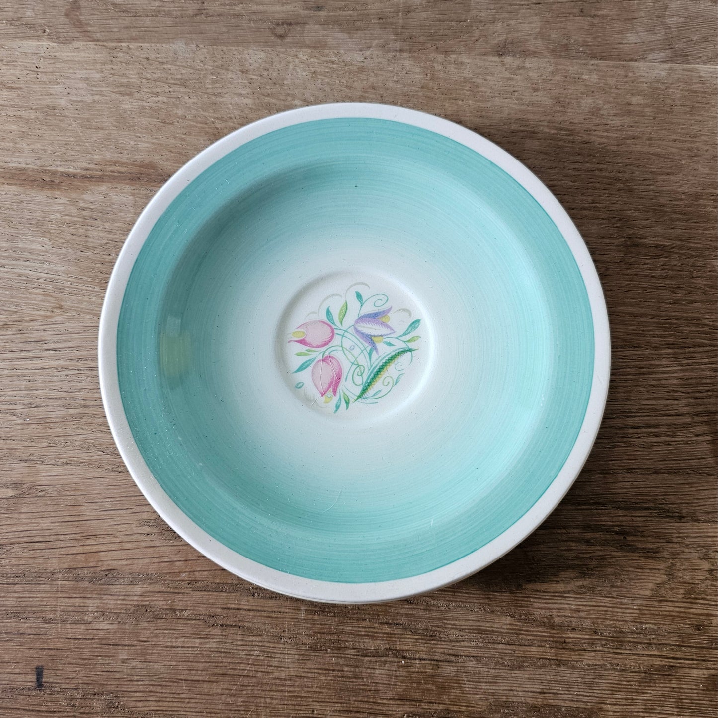 Pair of 1930s Susie Cooper "Dresden Spray" saucers