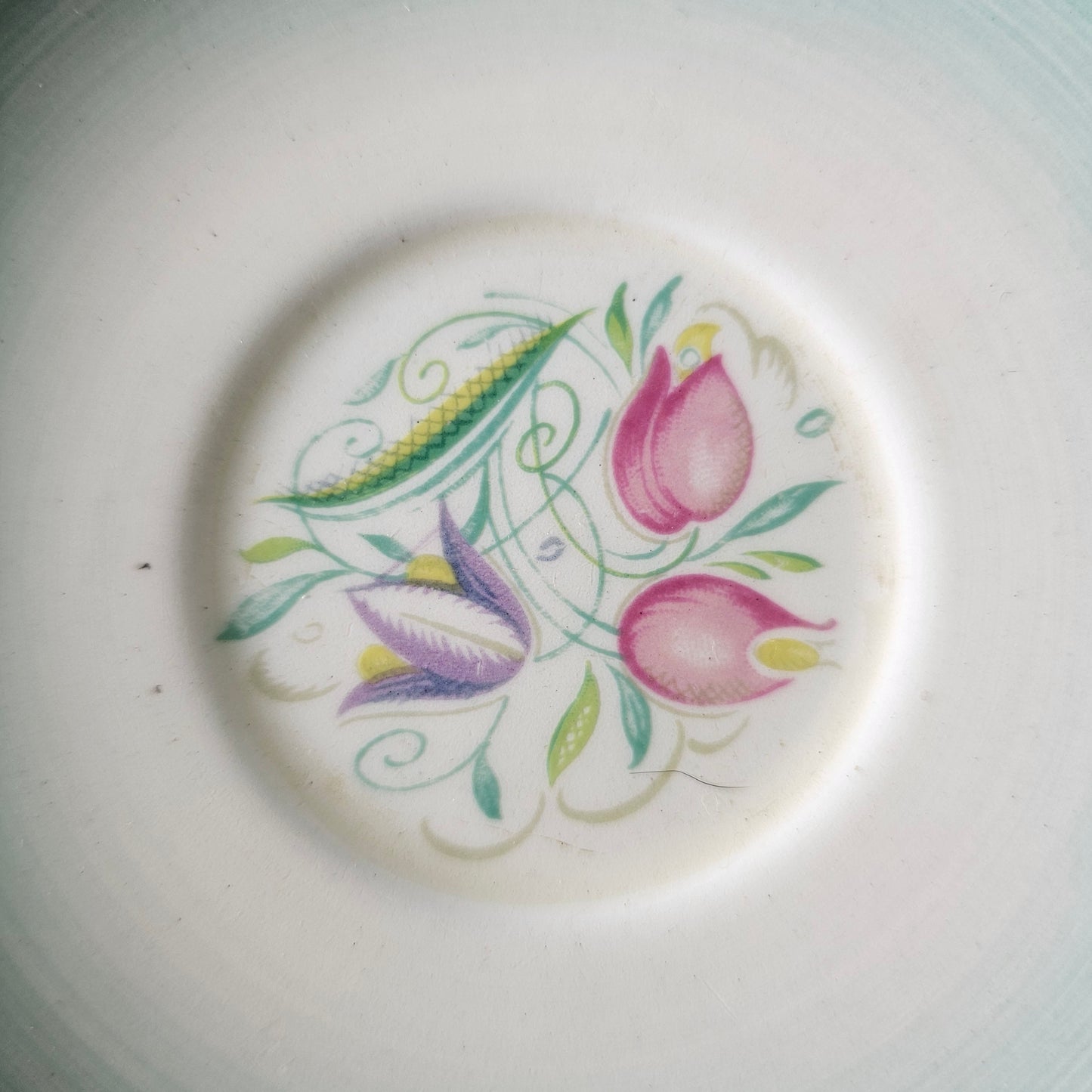 Pair of 1930s Susie Cooper "Dresden Spray" saucers