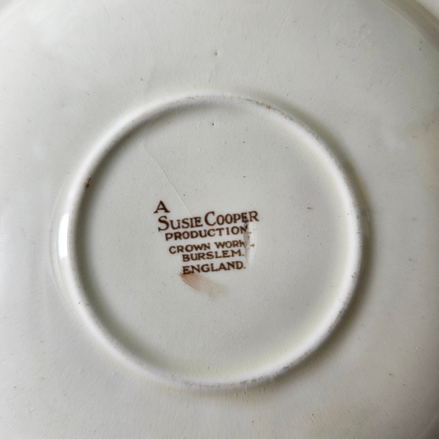 Pair of 1930s Susie Cooper "Dresden Spray" saucers