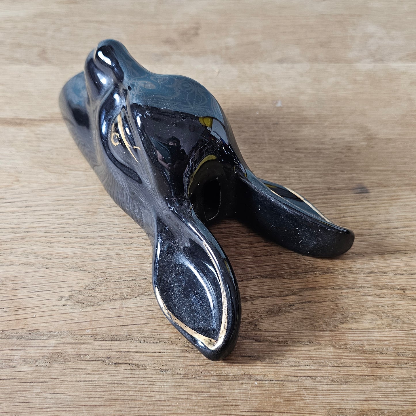 Pair of 1950s black ceramic deer head wall plaques with 22 carat gold detailing