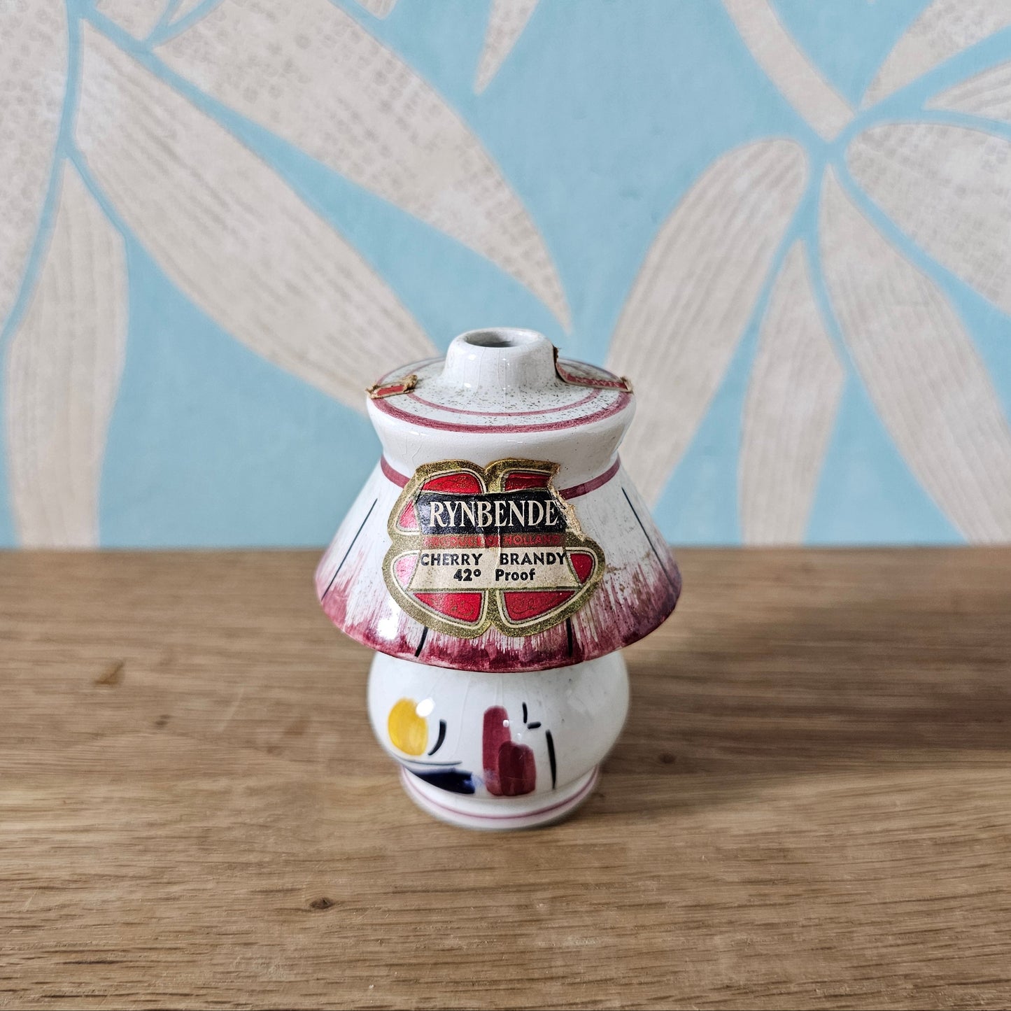 circa. 1950s Rynbende Holland Cherry Brandy ceramic lamp-shaped miniature bottle