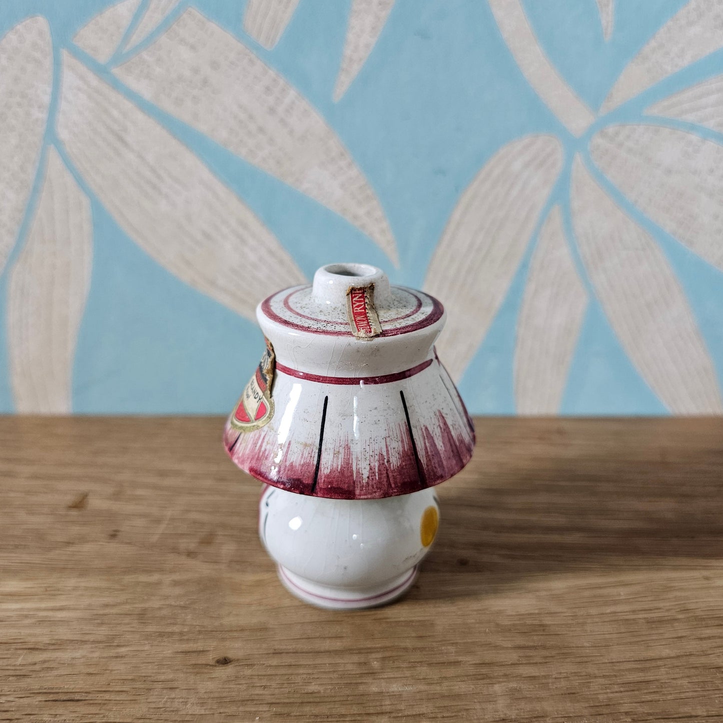 circa. 1950s Rynbende Holland Cherry Brandy ceramic lamp-shaped miniature bottle