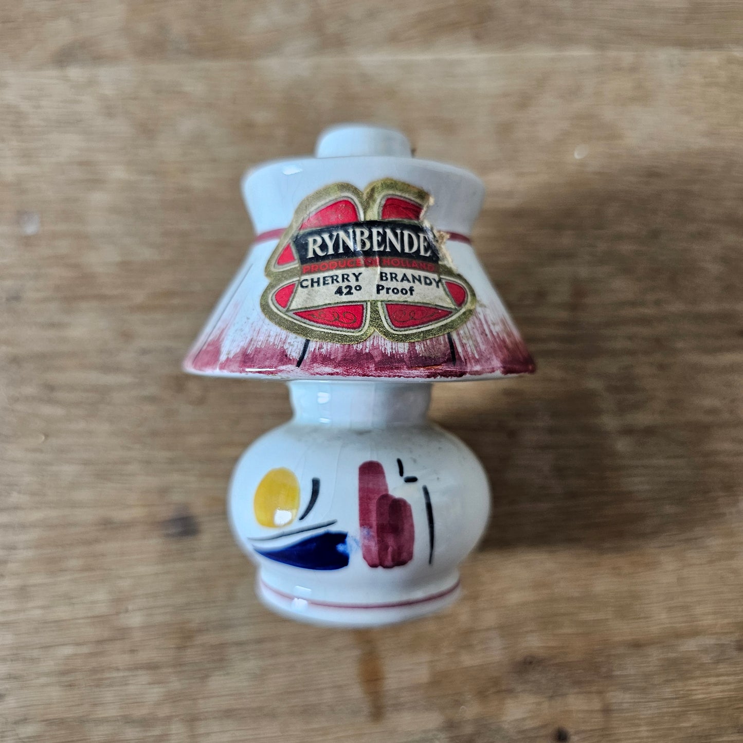circa. 1950s Rynbende Holland Cherry Brandy ceramic lamp-shaped miniature bottle