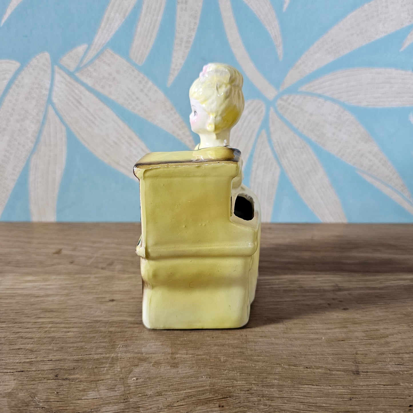 1950s girl in yellow dress playing piano ceramic bud vase figurine