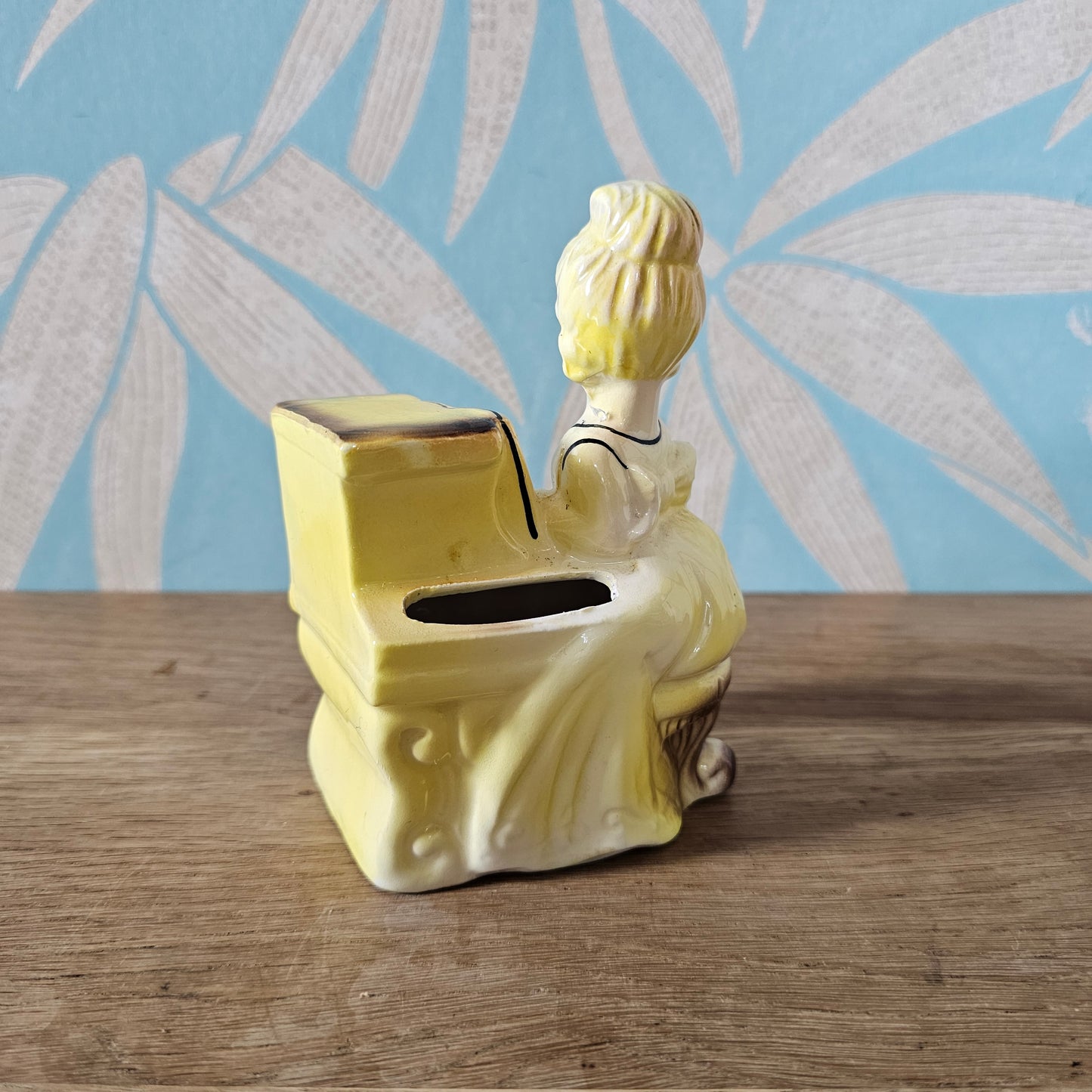 1950s girl in yellow dress playing piano ceramic bud vase figurine
